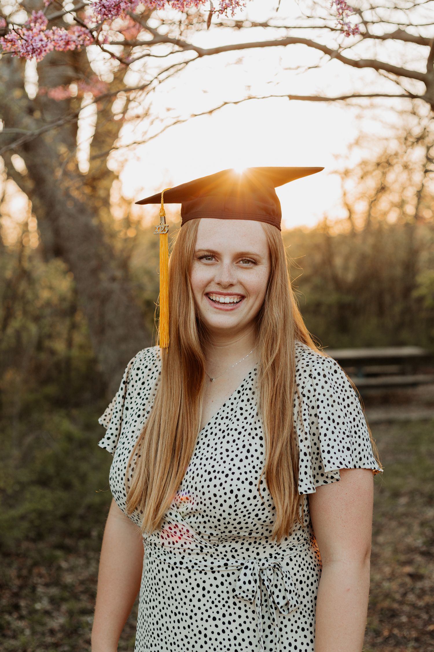 Senior photos in Manhattan, Kansas by portrait photographer – golden hour outdoor session with natural, candid senior portraits.