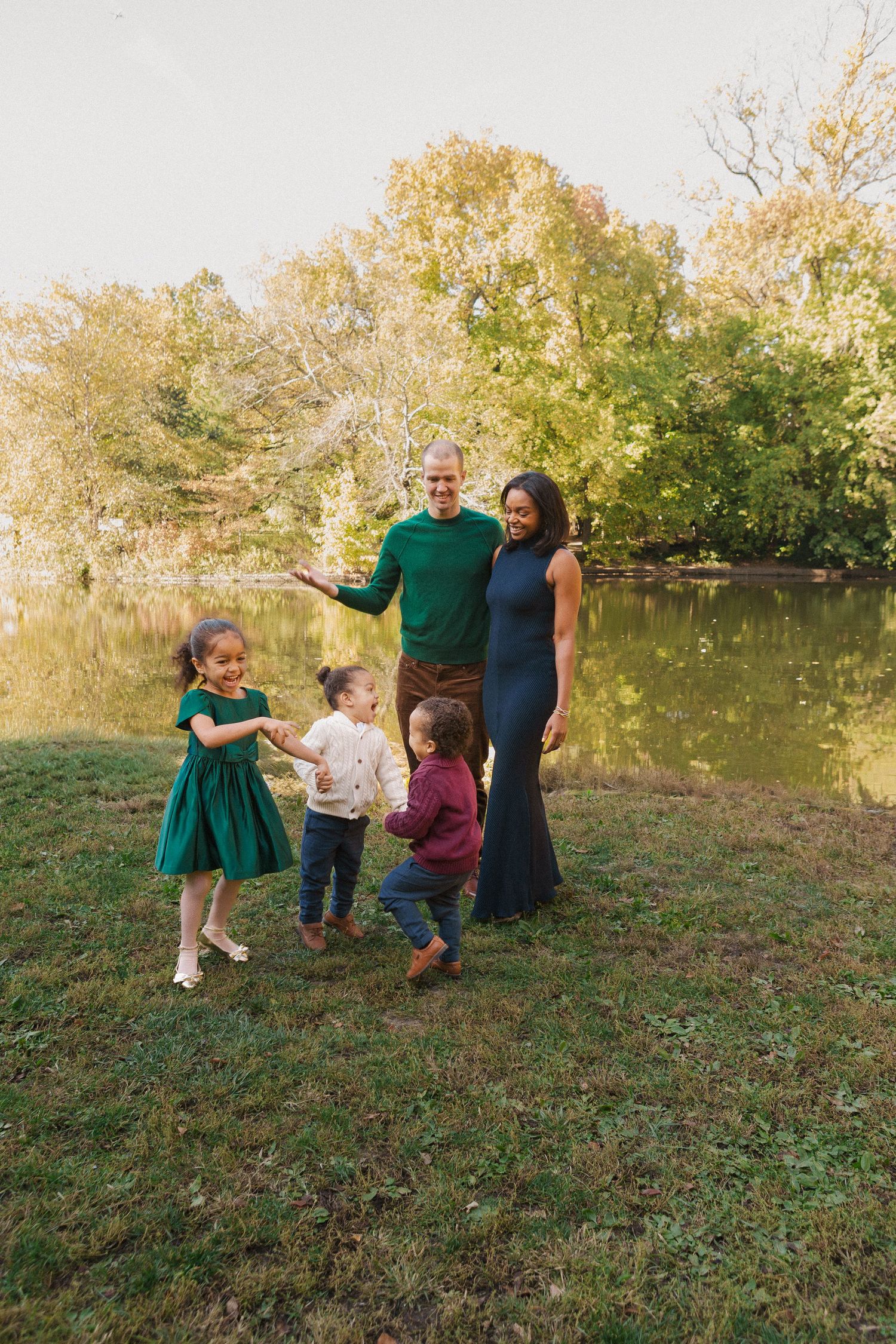 Paula Brearley family photography session capturing tender moments between parents and their children in New York City