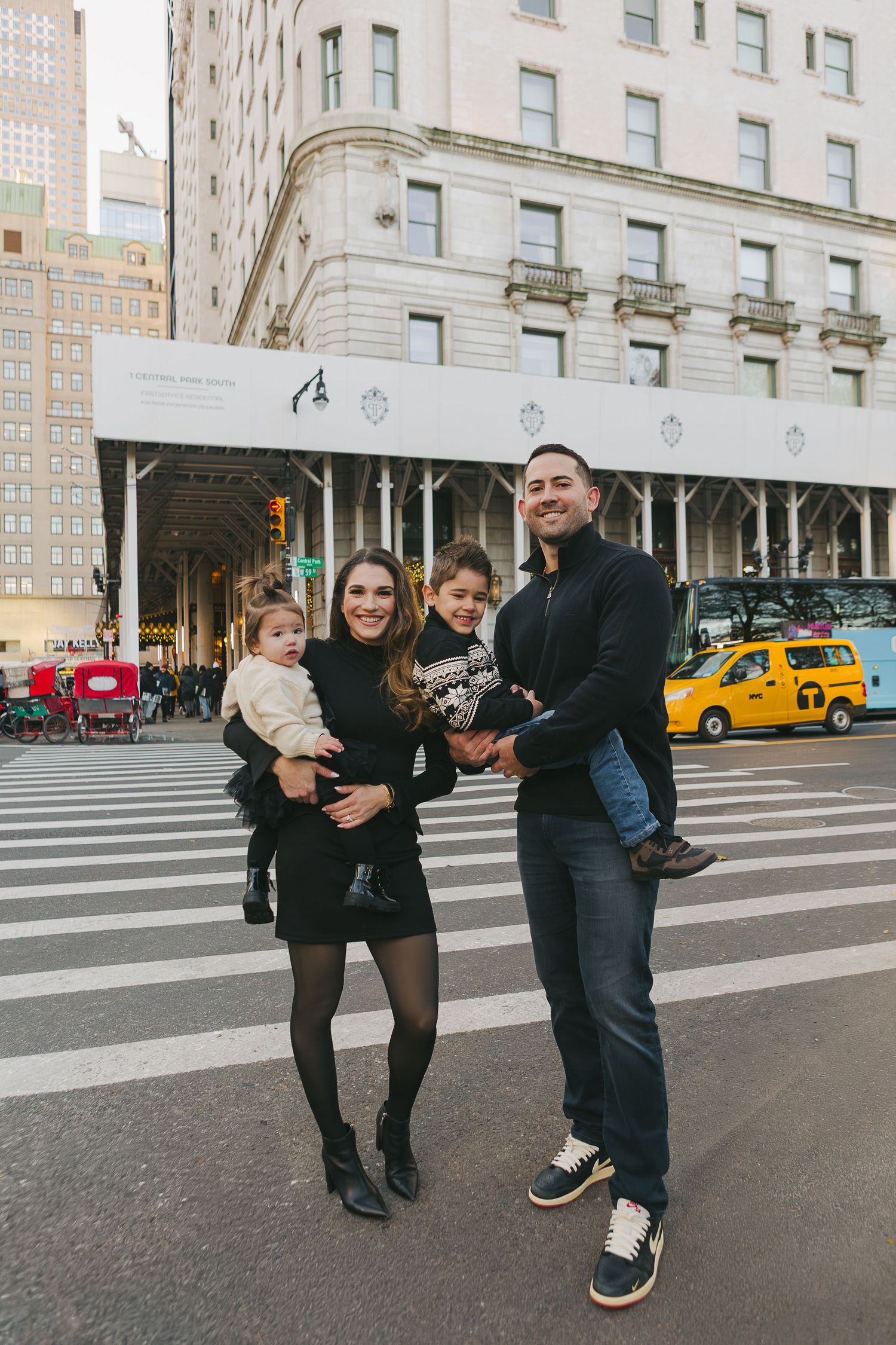 Candid family photography by Paula Brearley in NYC, showcasing authentic connection between parents and young children
