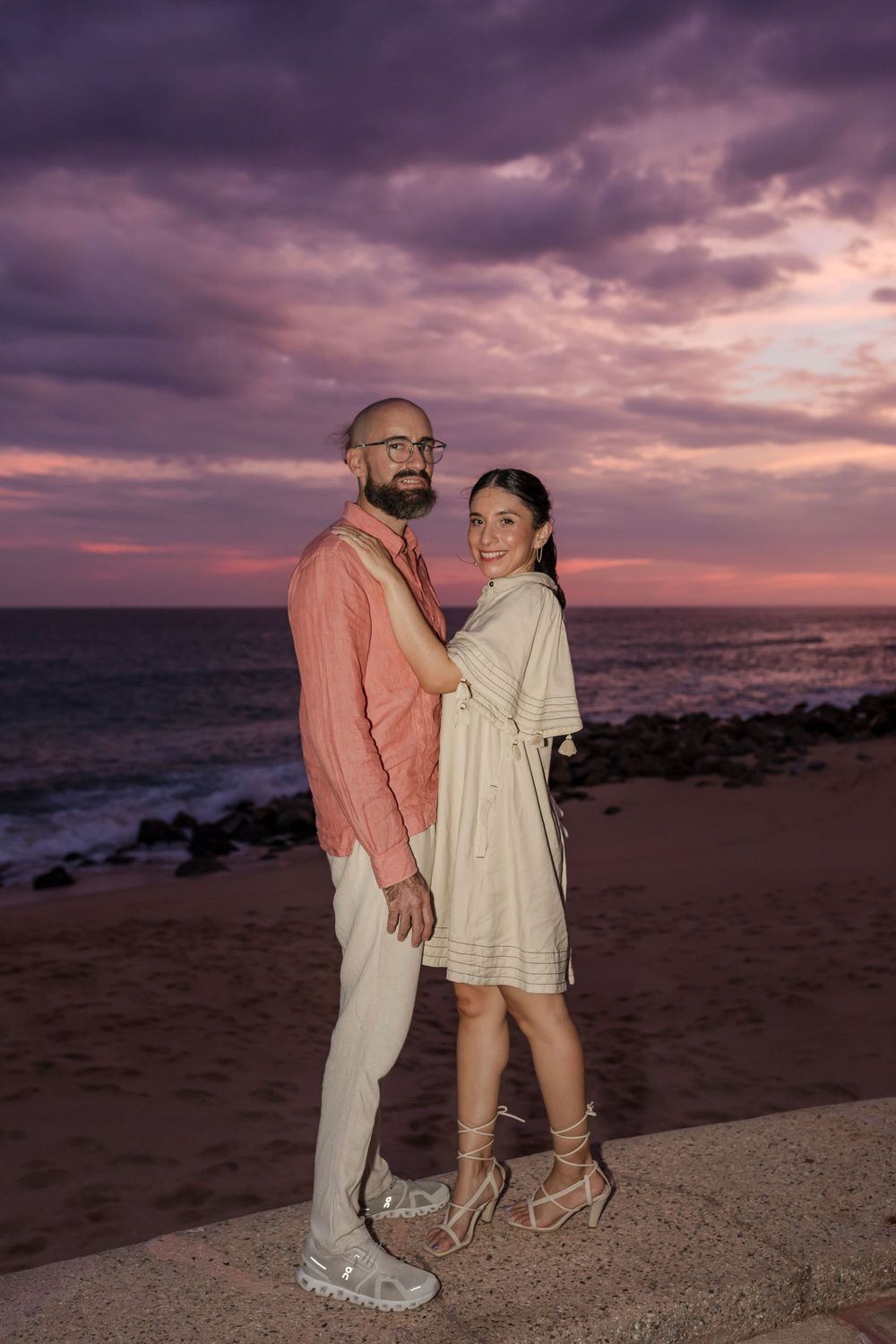 Romantic wedding portrait with dramatic sky