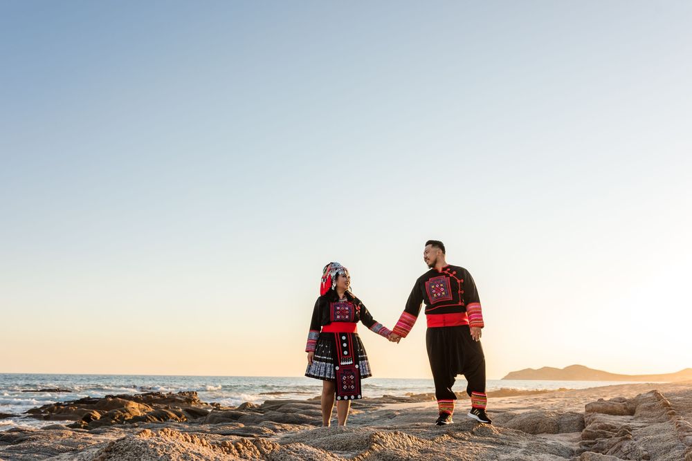 Couple enjoying sunset after wedding ceremony