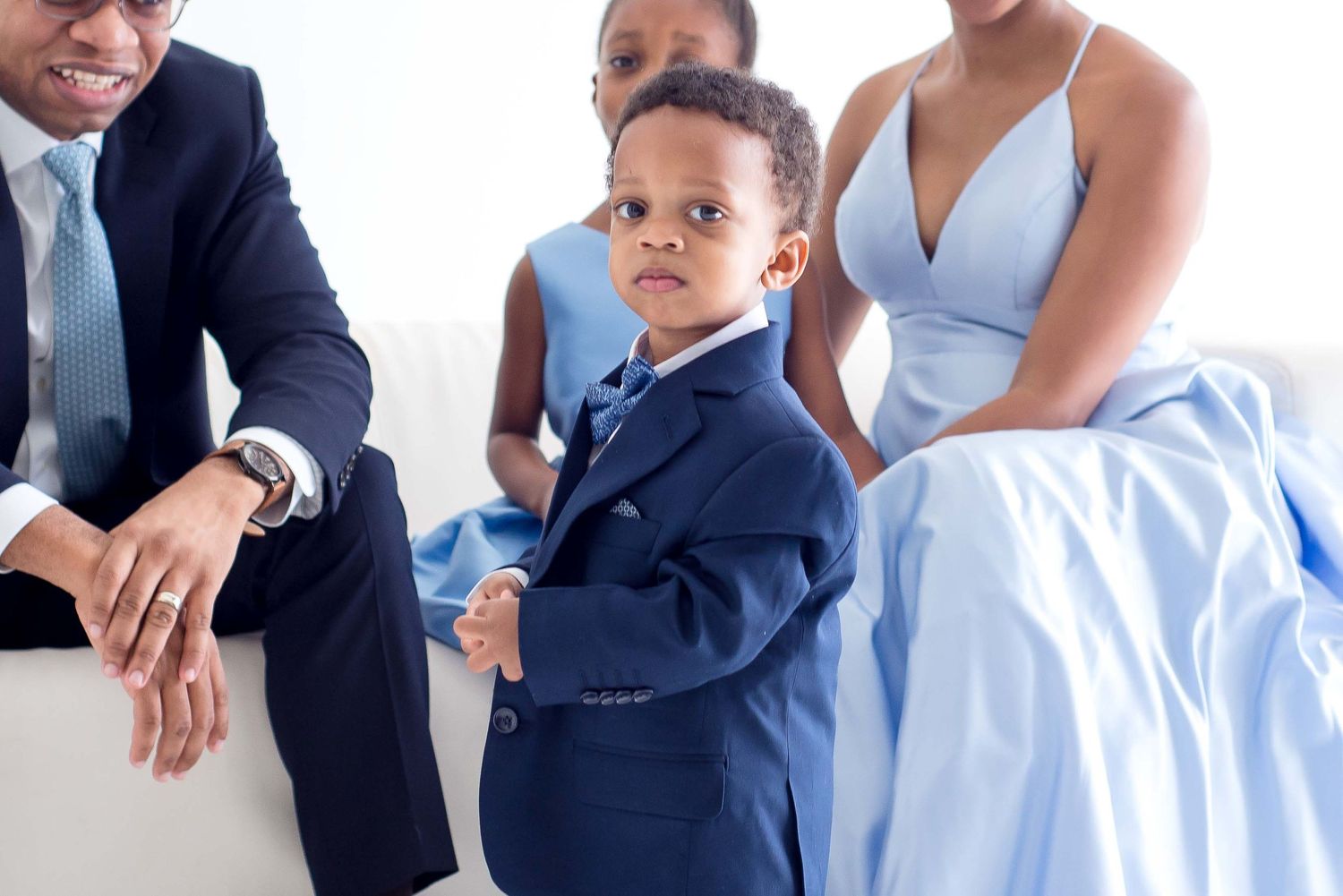 family of four in a white studio in houston texas