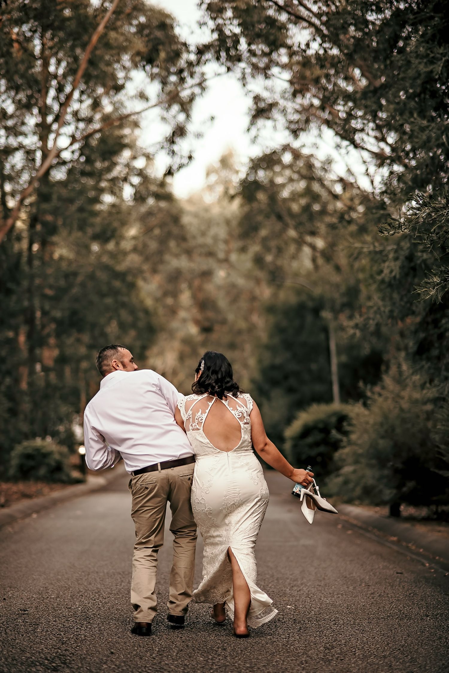 romantic image of bride and groom by tasmanian elopement and wedding photographer joss jensen