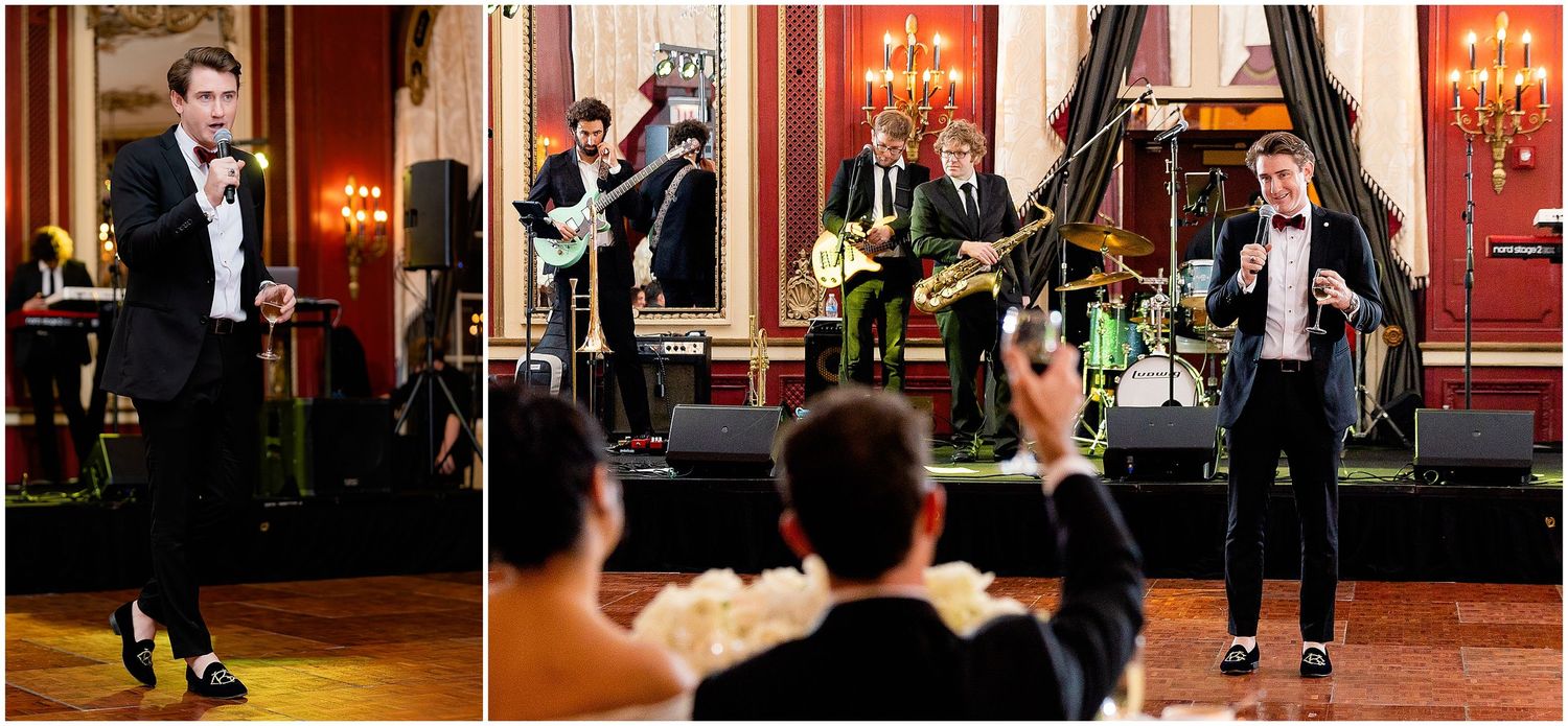 Live band performing at an elegant wedding reception in a classic red-walled ballroom.