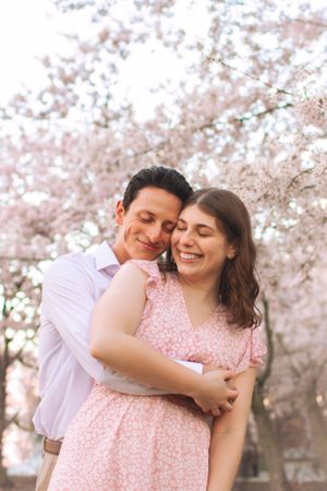 young-couple-cherry-blossom-portrait