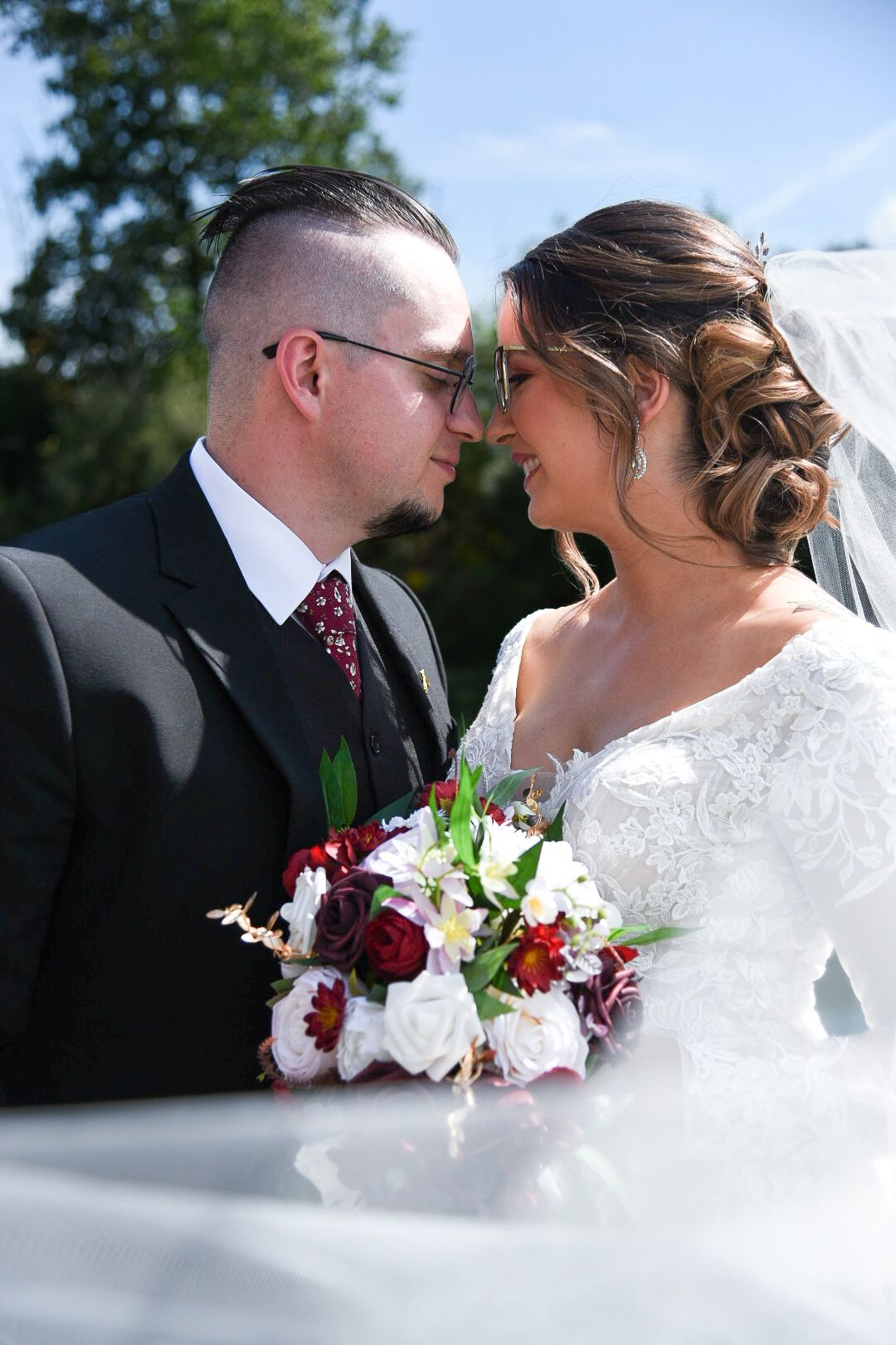 A romantic wedding photo sequence featuring white and red floral bouquet details.