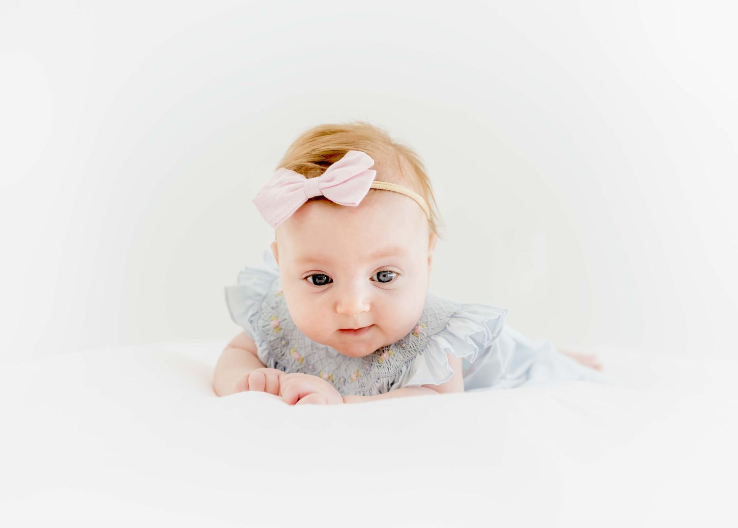baby milestone portrait in an all white theme natural light studio in houston texas