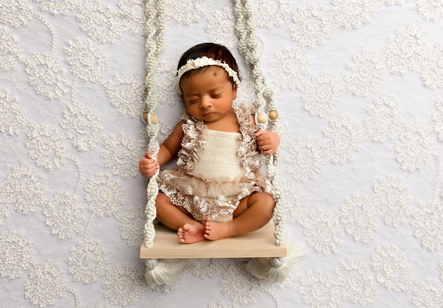 Newborn sleeping on swing. Newborn session. New Hampshire Newborn Photographer