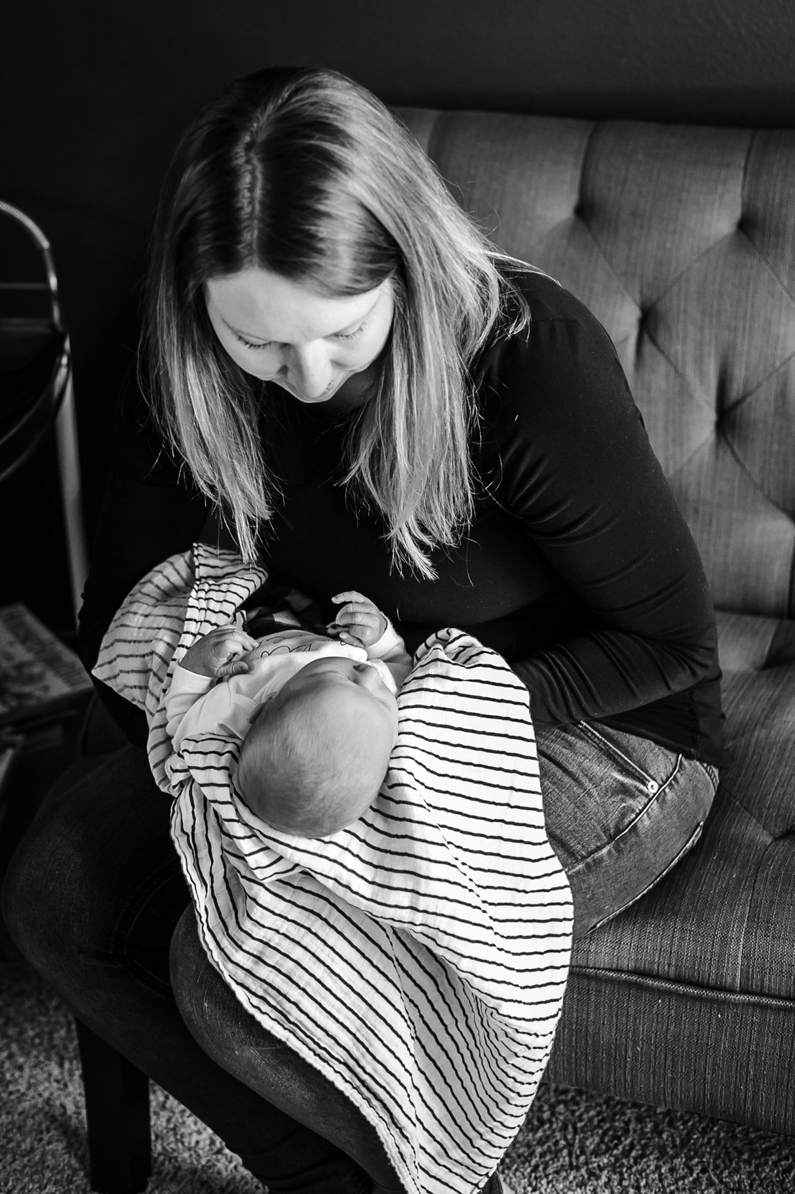 Mother holding her newborn son.