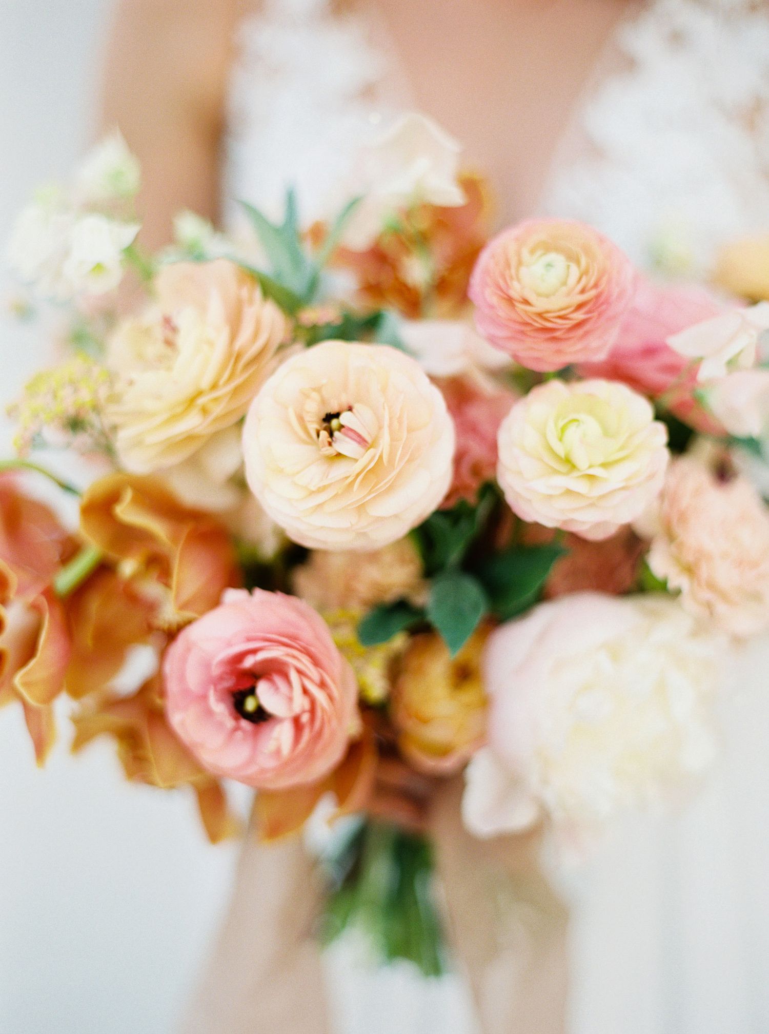 A bride in Prague with a lovely bouquet of flowers on her wedding day.