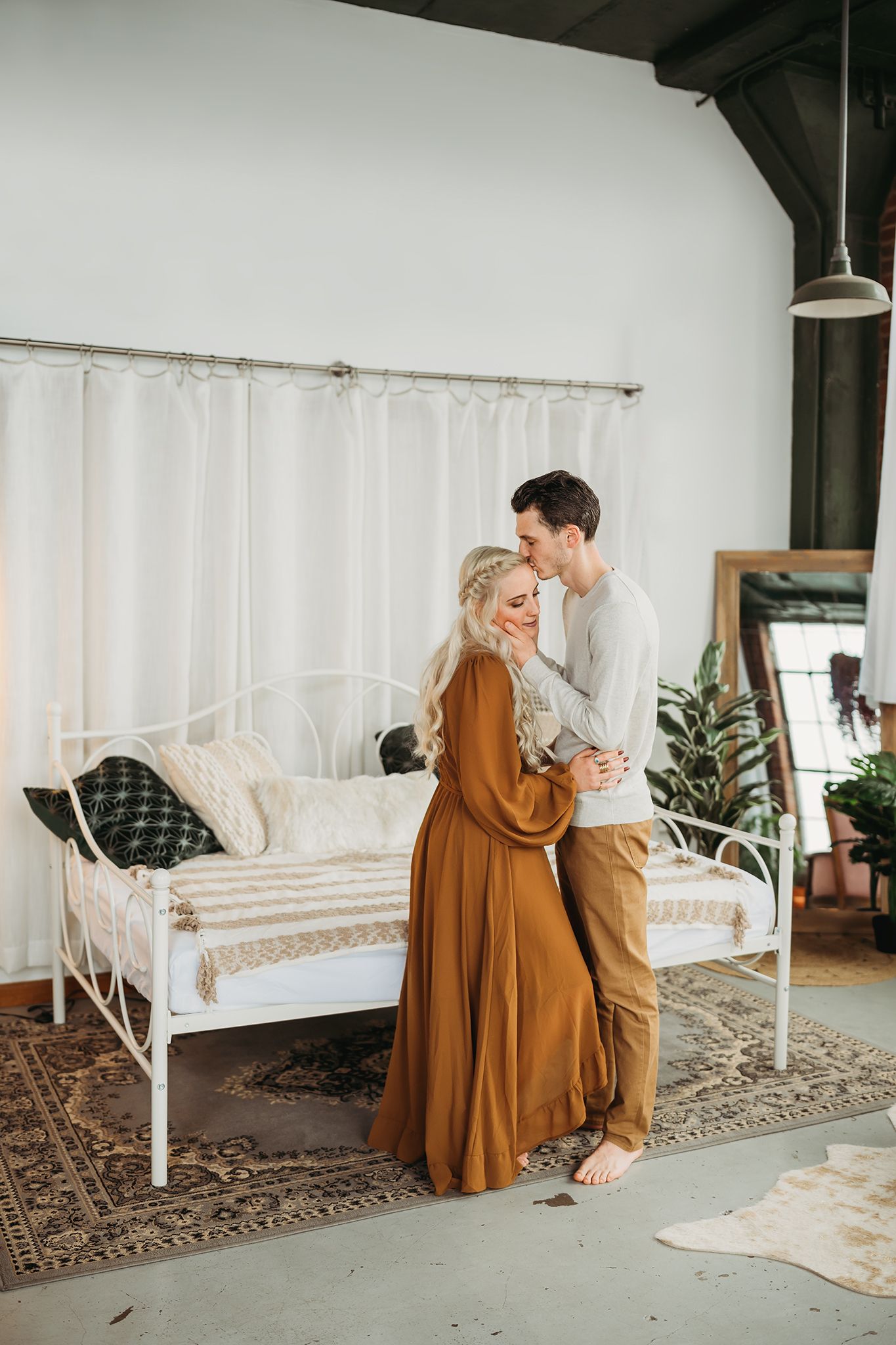 Engaged couple embracing in Akron Ohio captured by Jessica Hepp Photography