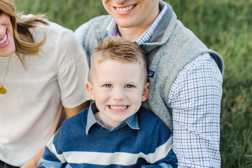Close up outdoor portrait showing pure joy and connection during a family session.