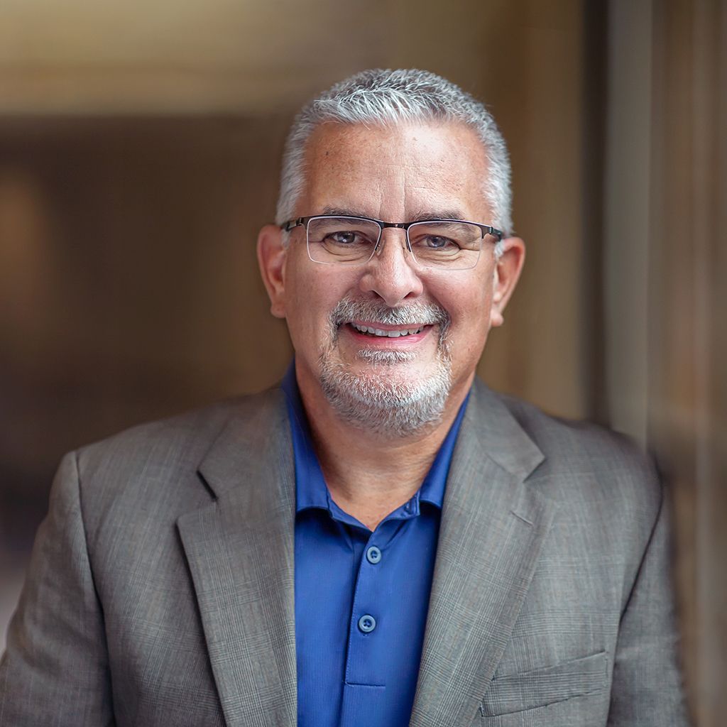 Headshot of man with glasses taken by the Tri Cities Headshot Photographer