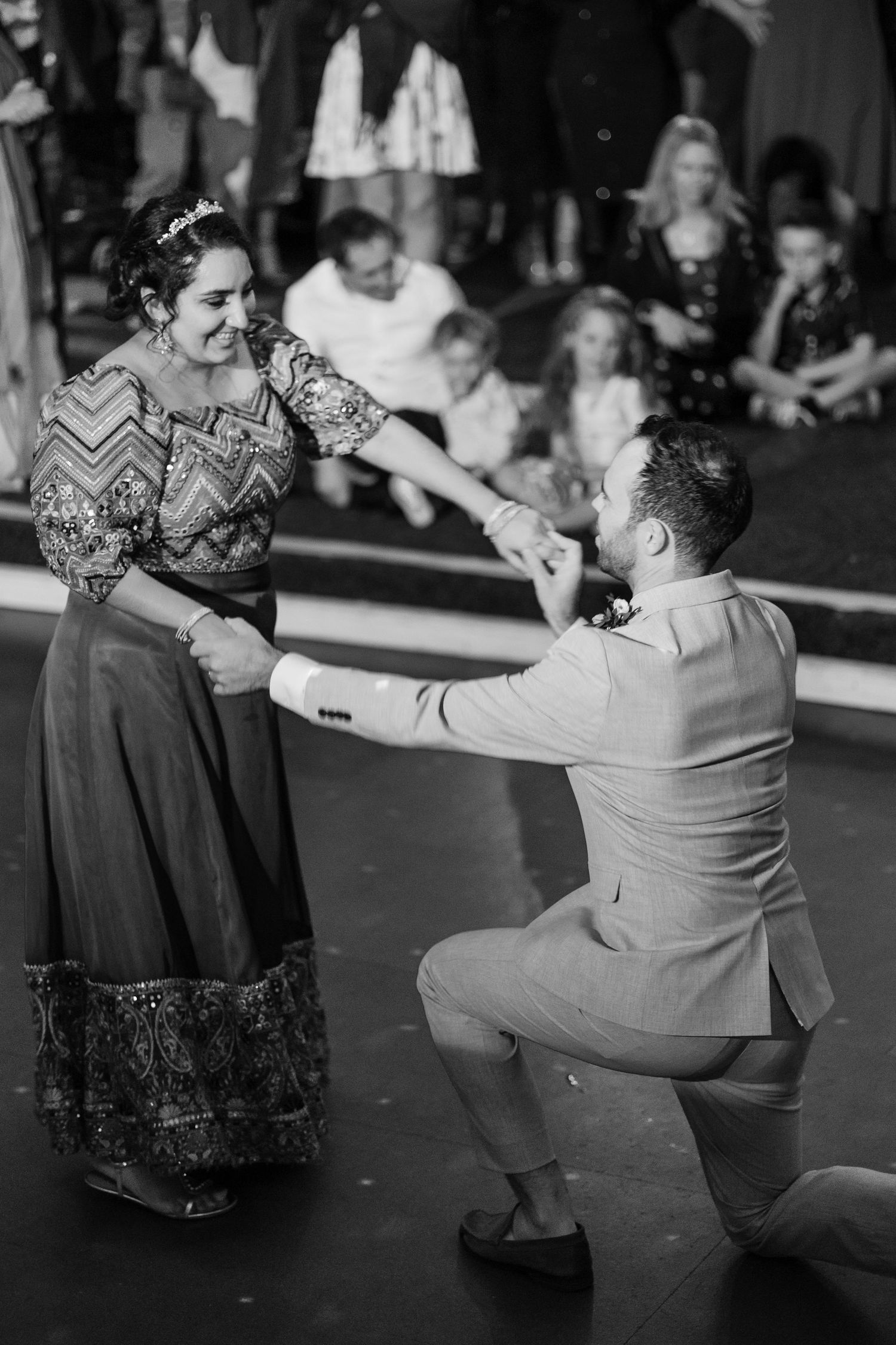 Bride and groom dancing during their wedding reception. North Hidden Farm Barn, Hungerford, Berkshire