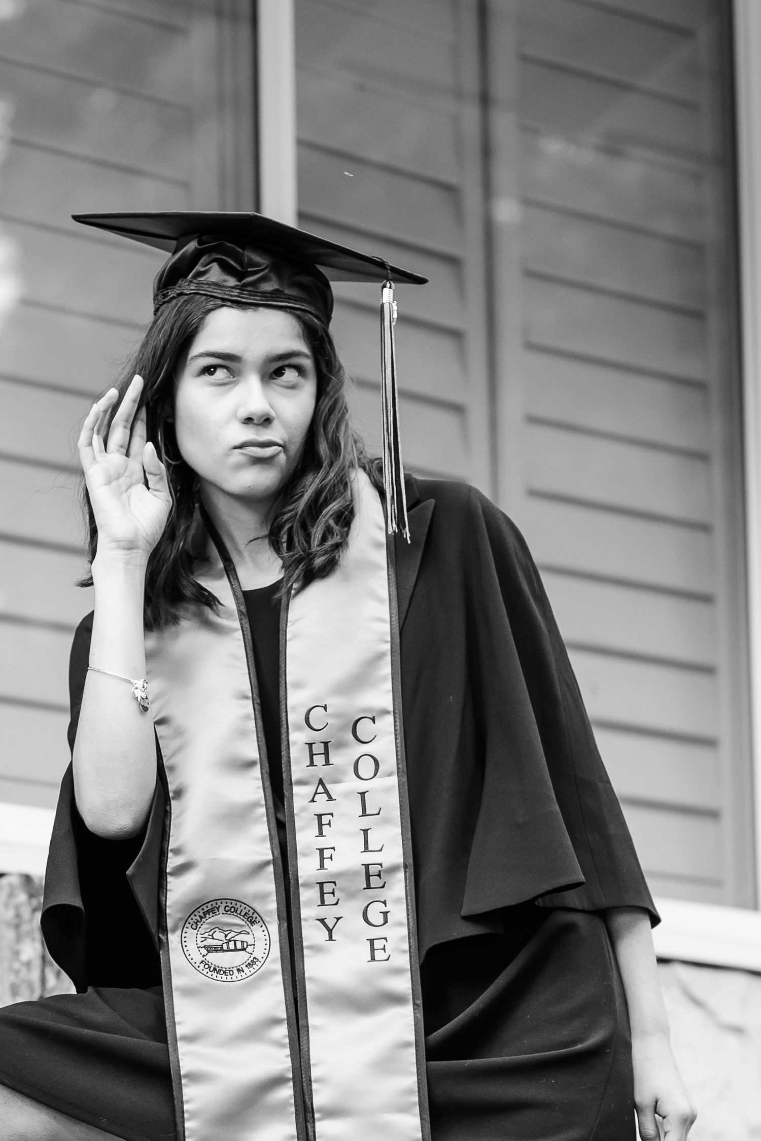 Chaffey College in CA graduate in cap and gown