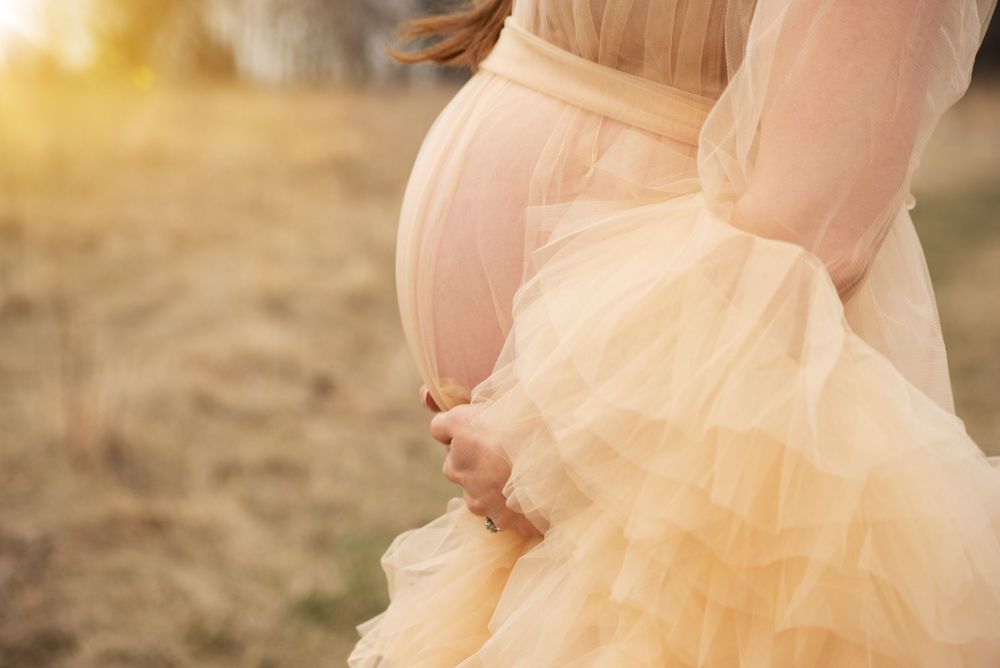 maternity session outdoor in Woodbury created by Precious Twenty-One Photography
