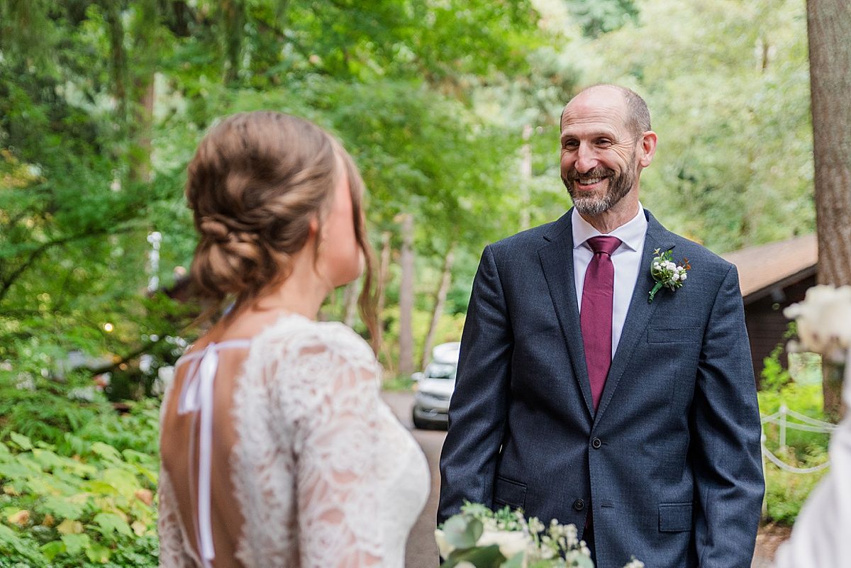 Father of the bride first look at wedding