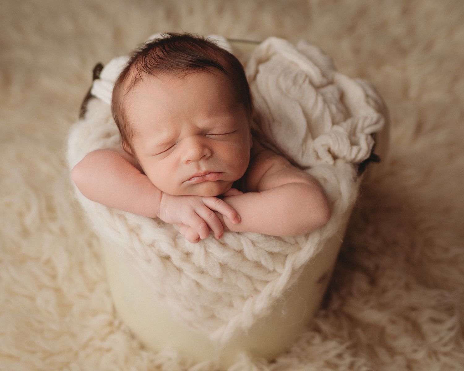 neutral baby colors newborn baby boy in bucket