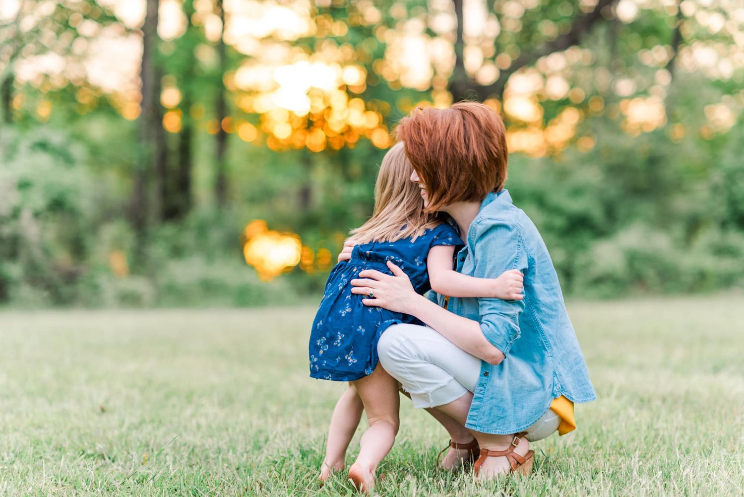 Mother and daughter hugging at sunset in Pittsburgh PA