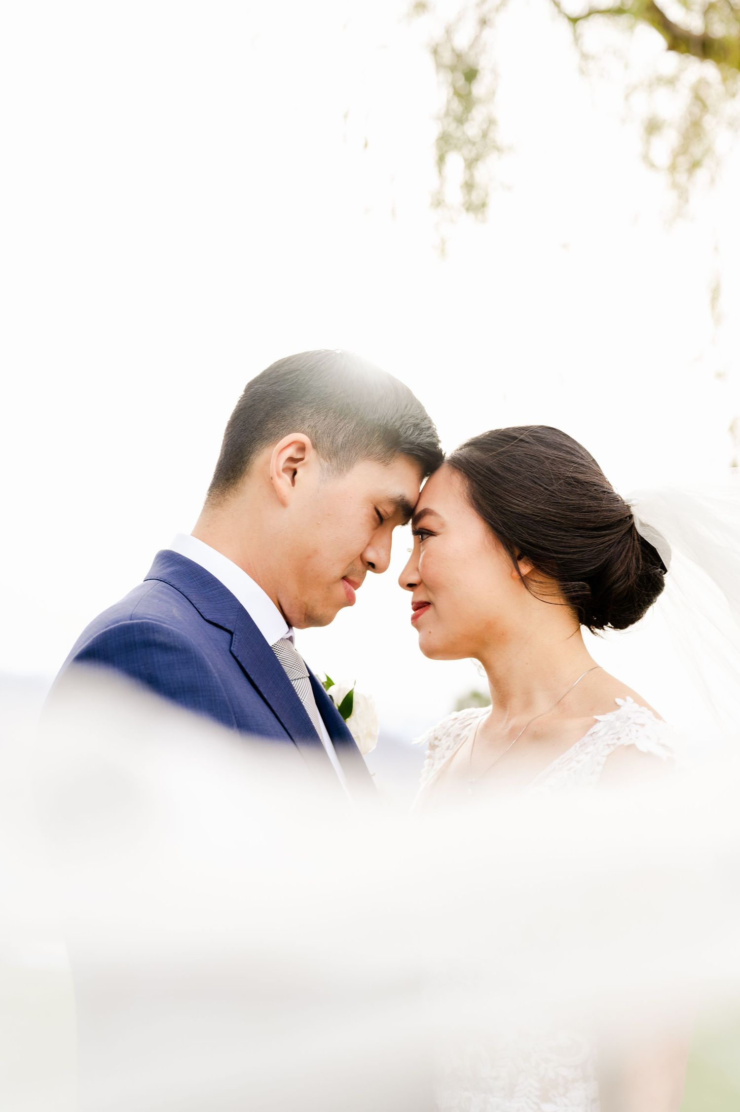 Romantic intimate moment captured during a wedding celebration.