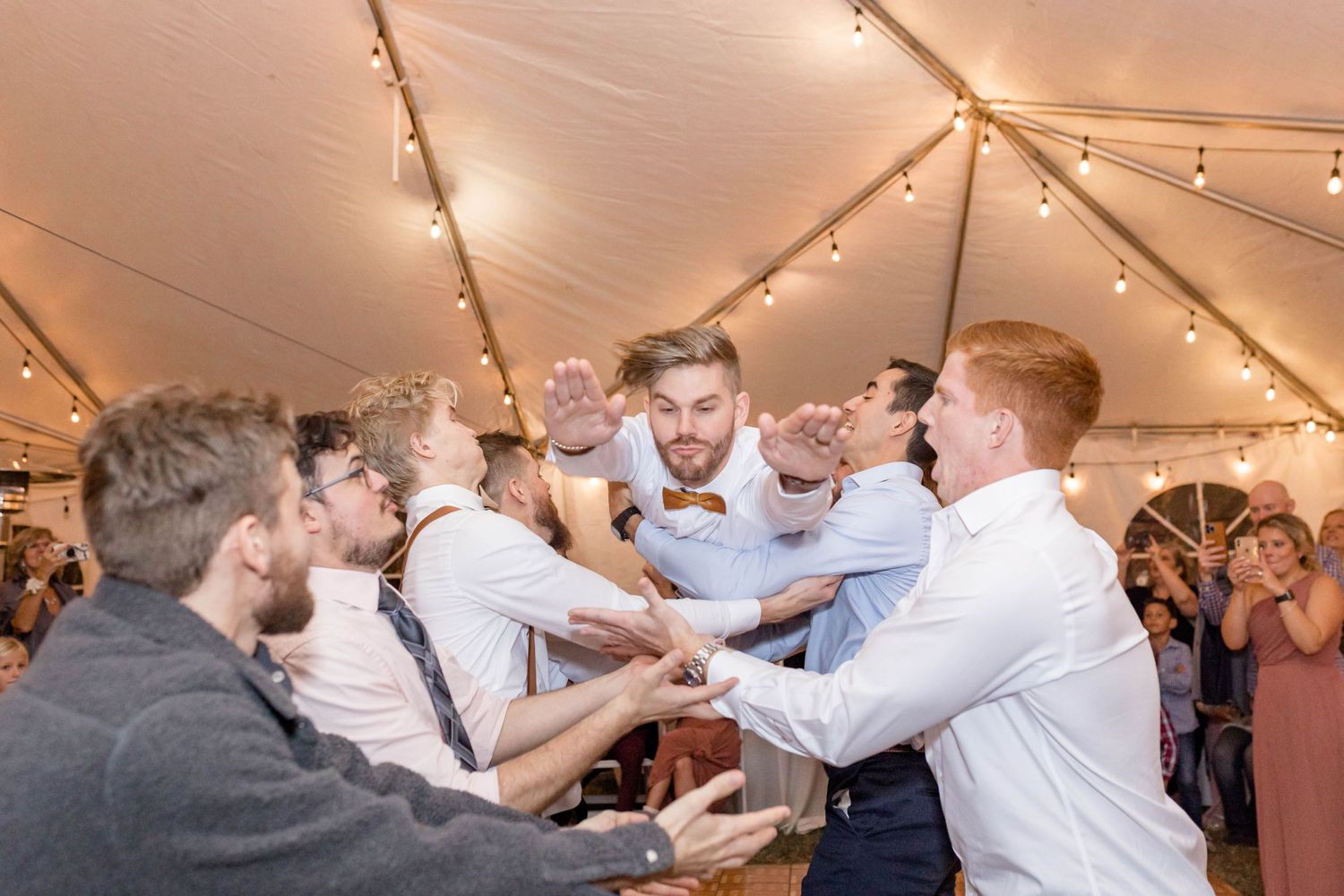 groom dives