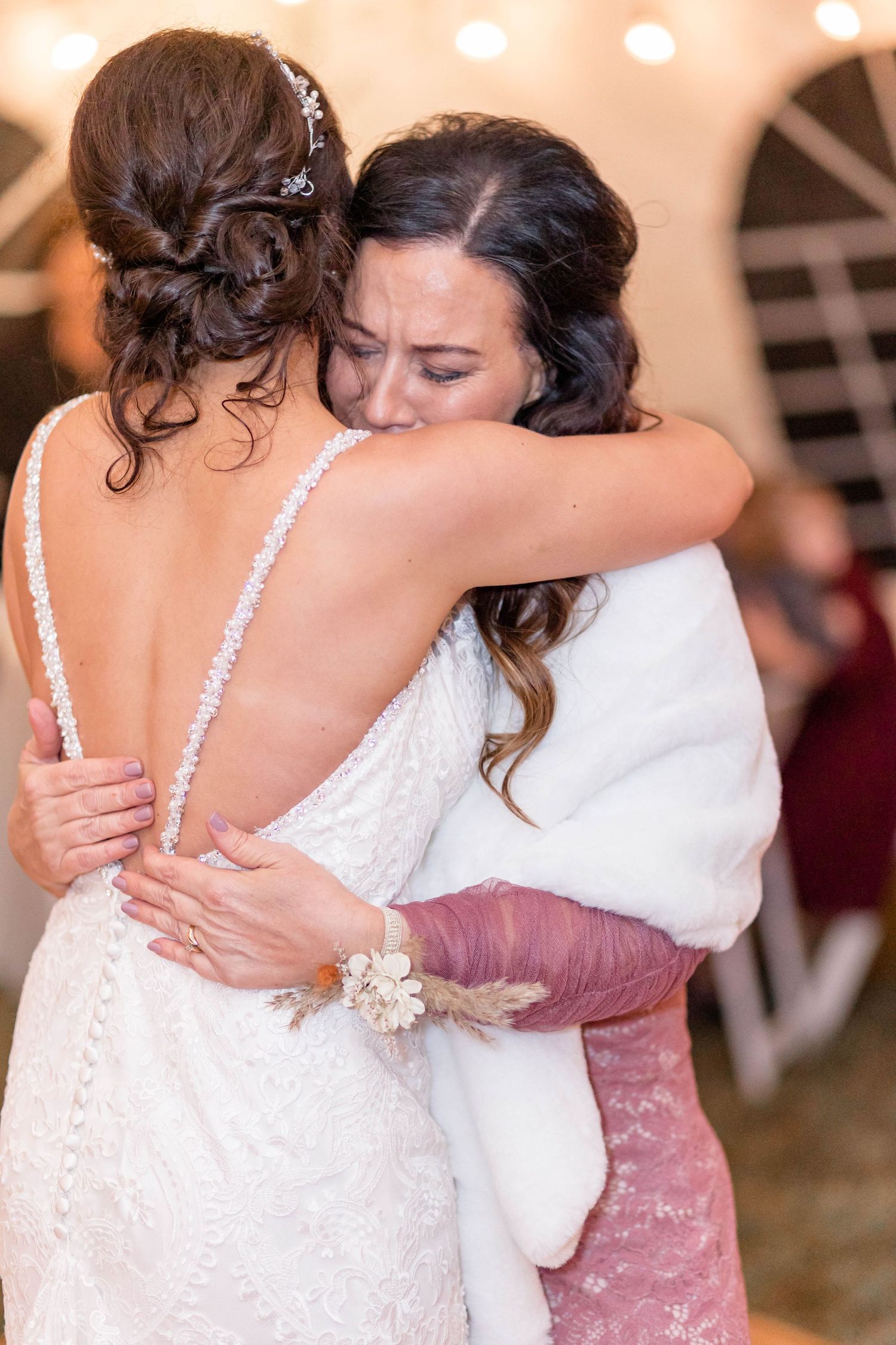 mom and bride dance
