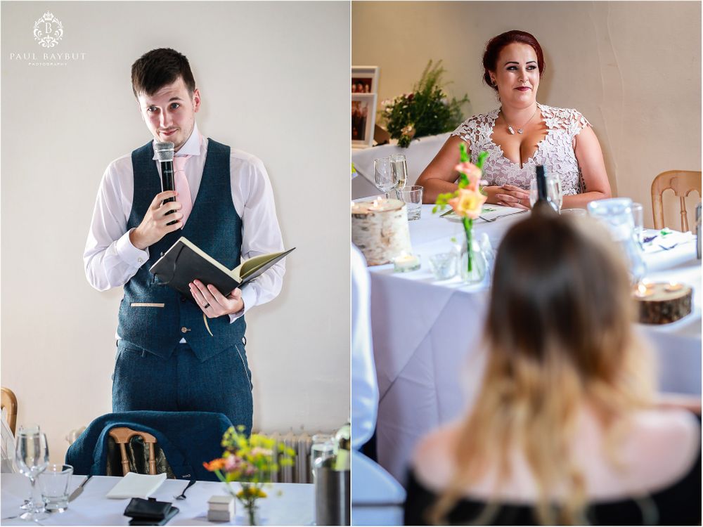 Wedding reception guests seated at an elegant table with white linens and floral centerpieces.