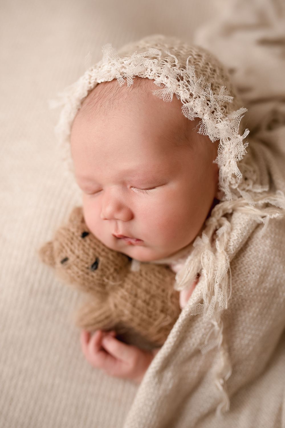 Newborn snuggling bear -Pueblo, Colorado Newborn Photographer