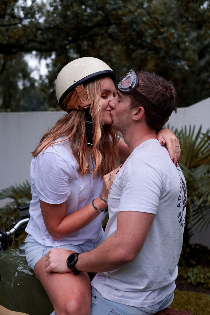 Couple kisses on motorcycle, Vaalpark.