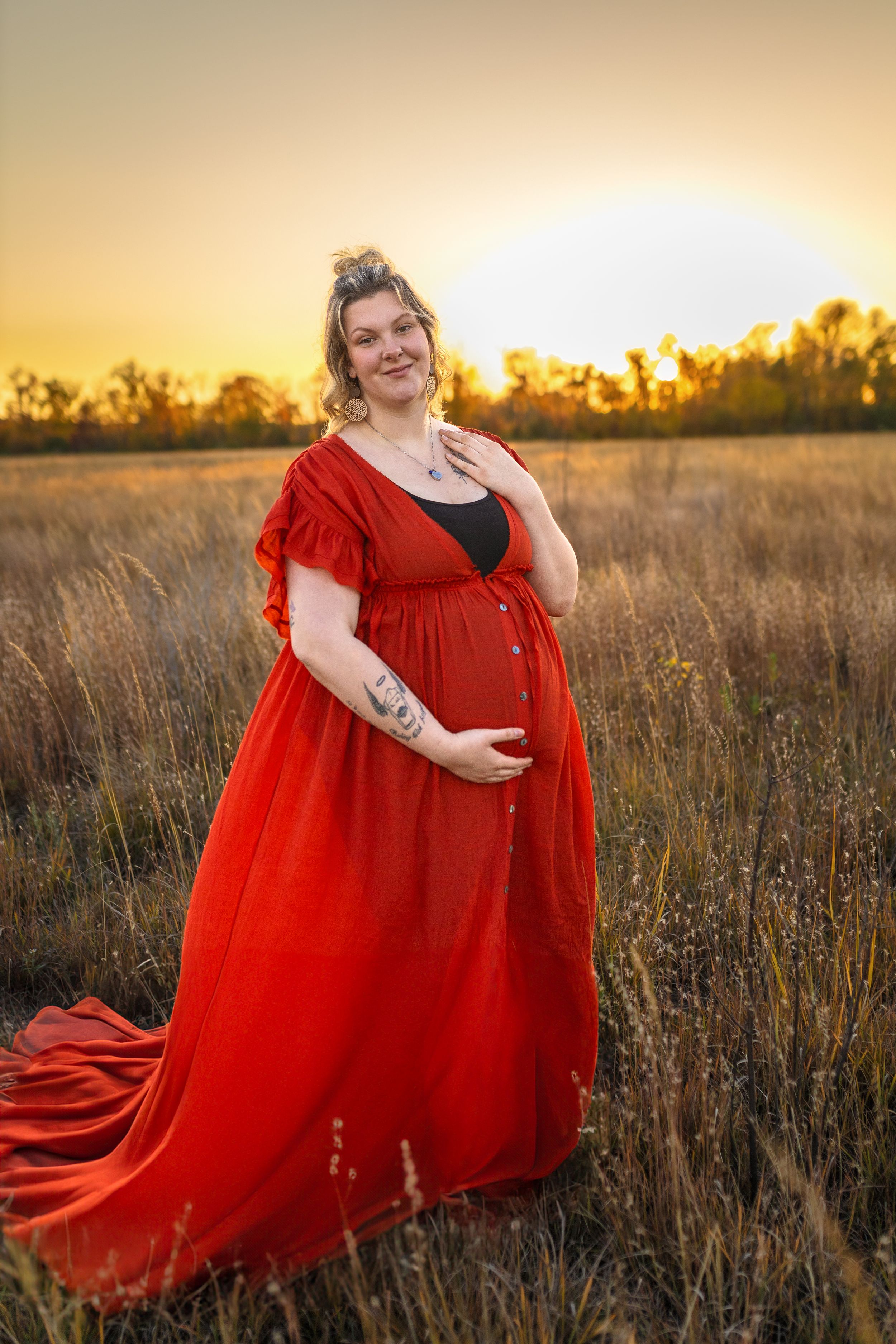 Flowing red maternity gown photo in golden field at sunset.
Janesville, WI
Brodhead, WI
