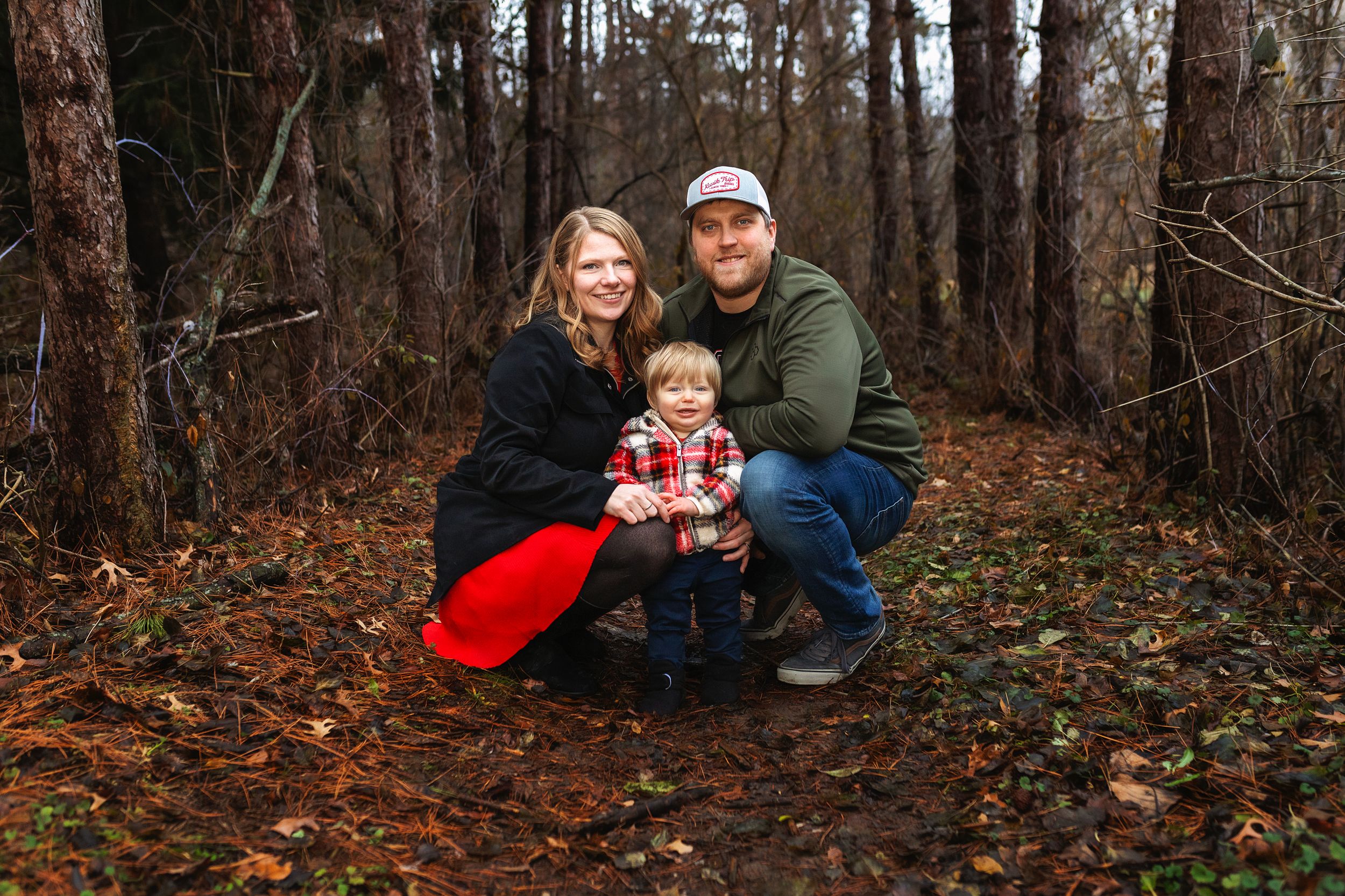Fall family portrait in wooded area with seasonal colors and casual styling.
Janesville, WI
Brodhead, WI