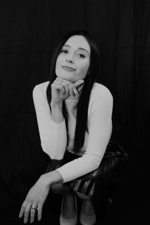 Moody black and white portraits showing contemplative poses in casual attire.