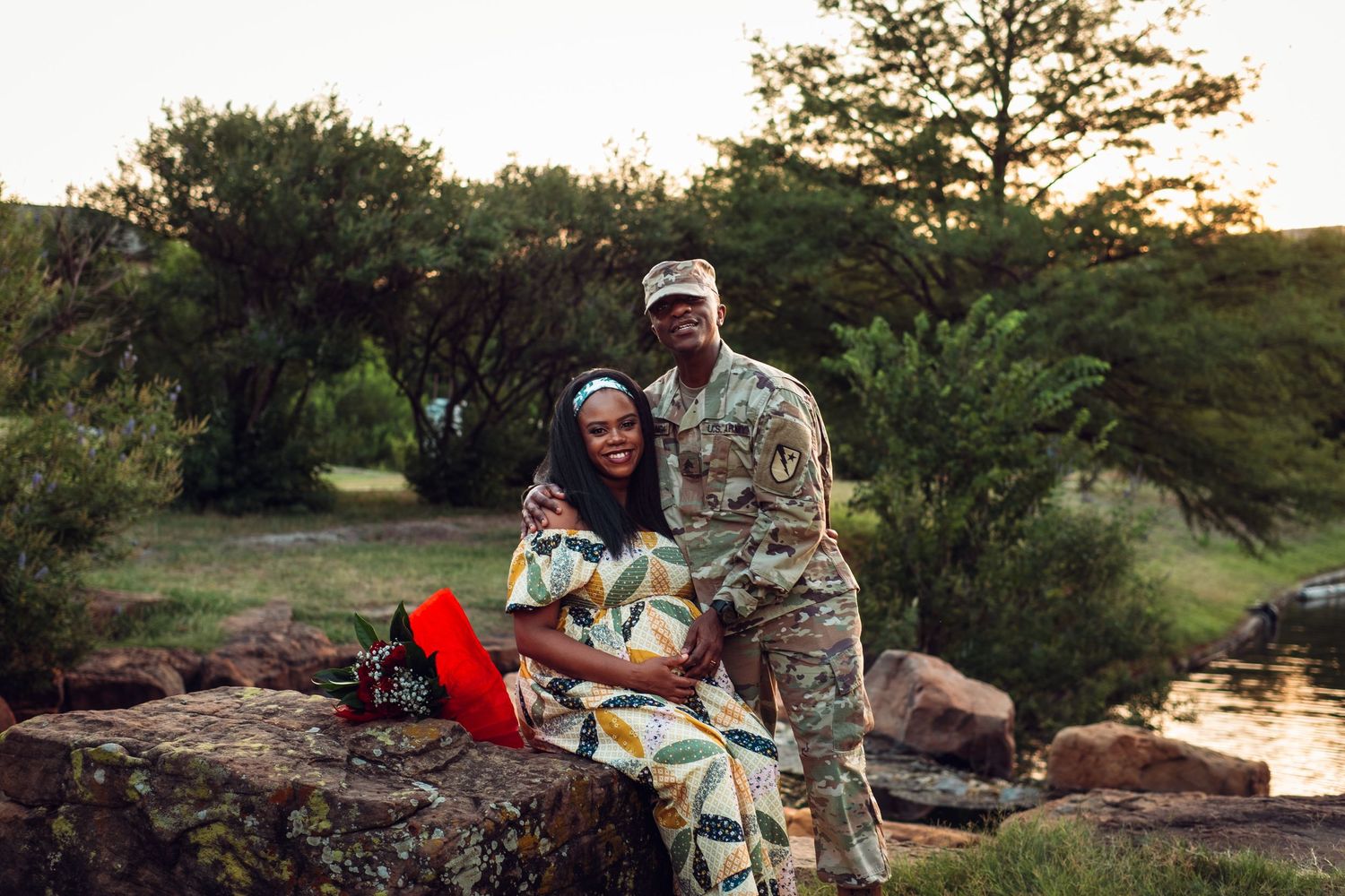Outdoor family photography session near a lake at sunset.