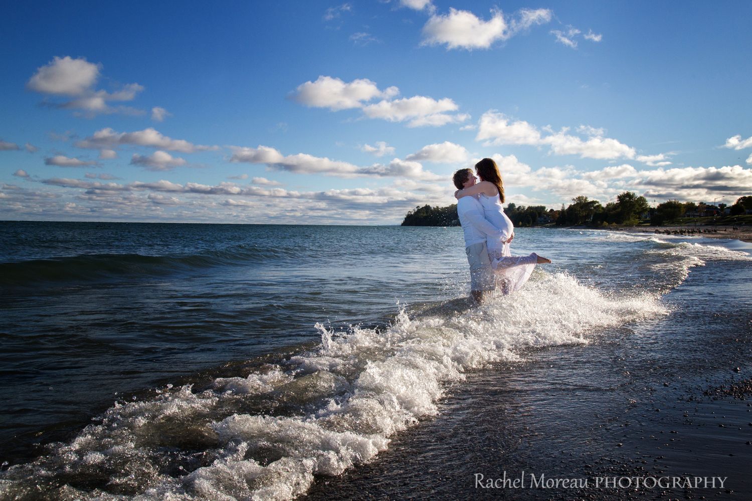 Couple in Lake Michigan, Algoma, WI, by Rachel Moreau Photography.
