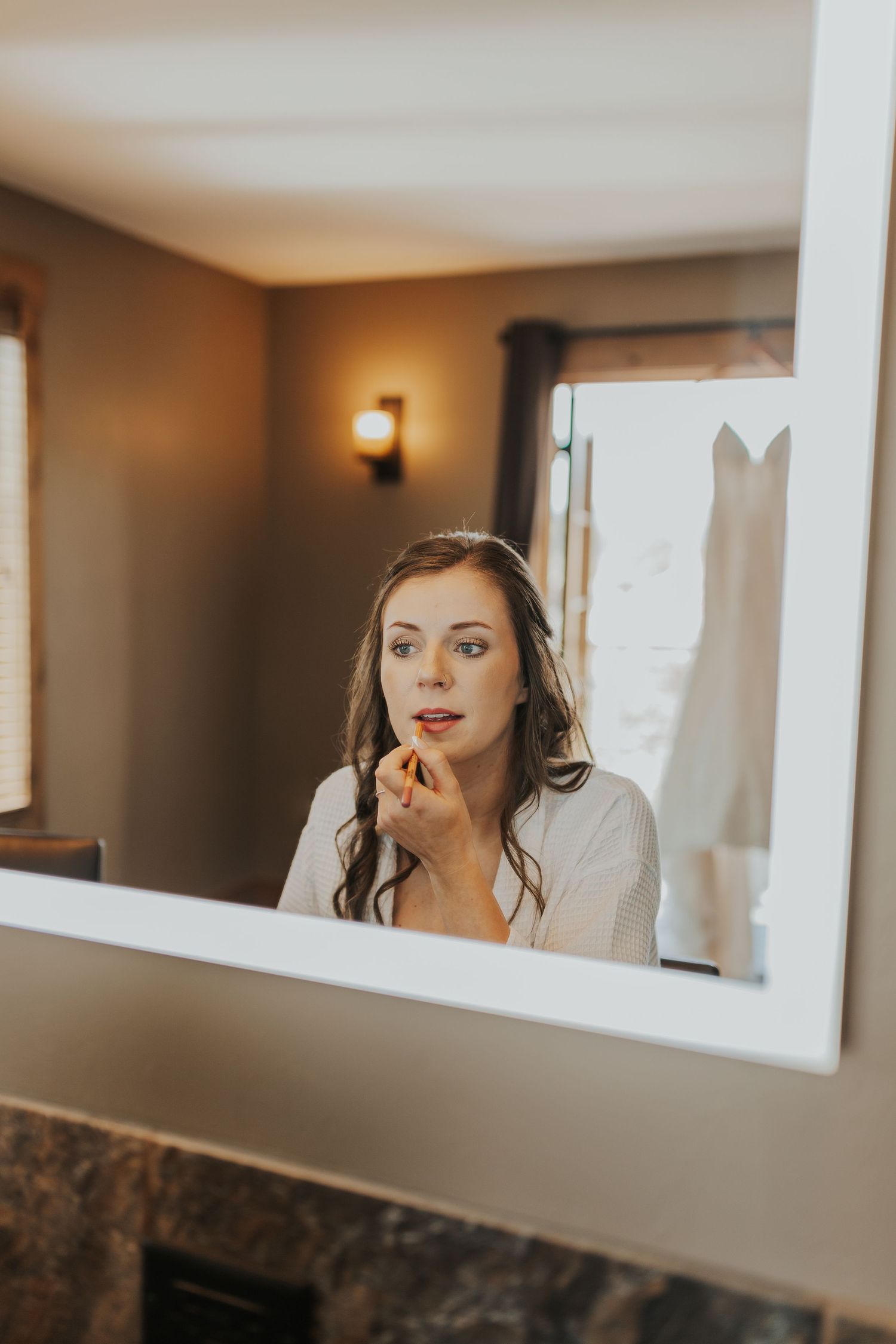 Bride getting ready Estes Park, Colorado wedding photographer