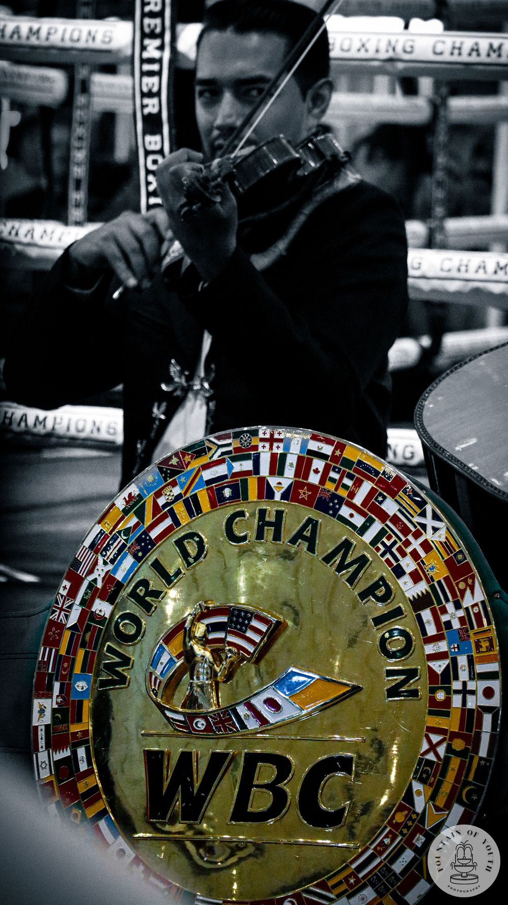 Unidentified mariachi band member pictured standing behind WBC championship belt at MGM Grand Las Vegas in Las Vegas, Nevada.