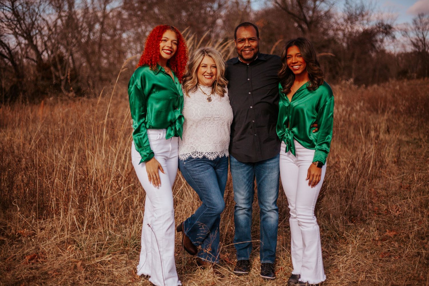 Family group portraits in coordinated white and green outfits against autumn backdrop.