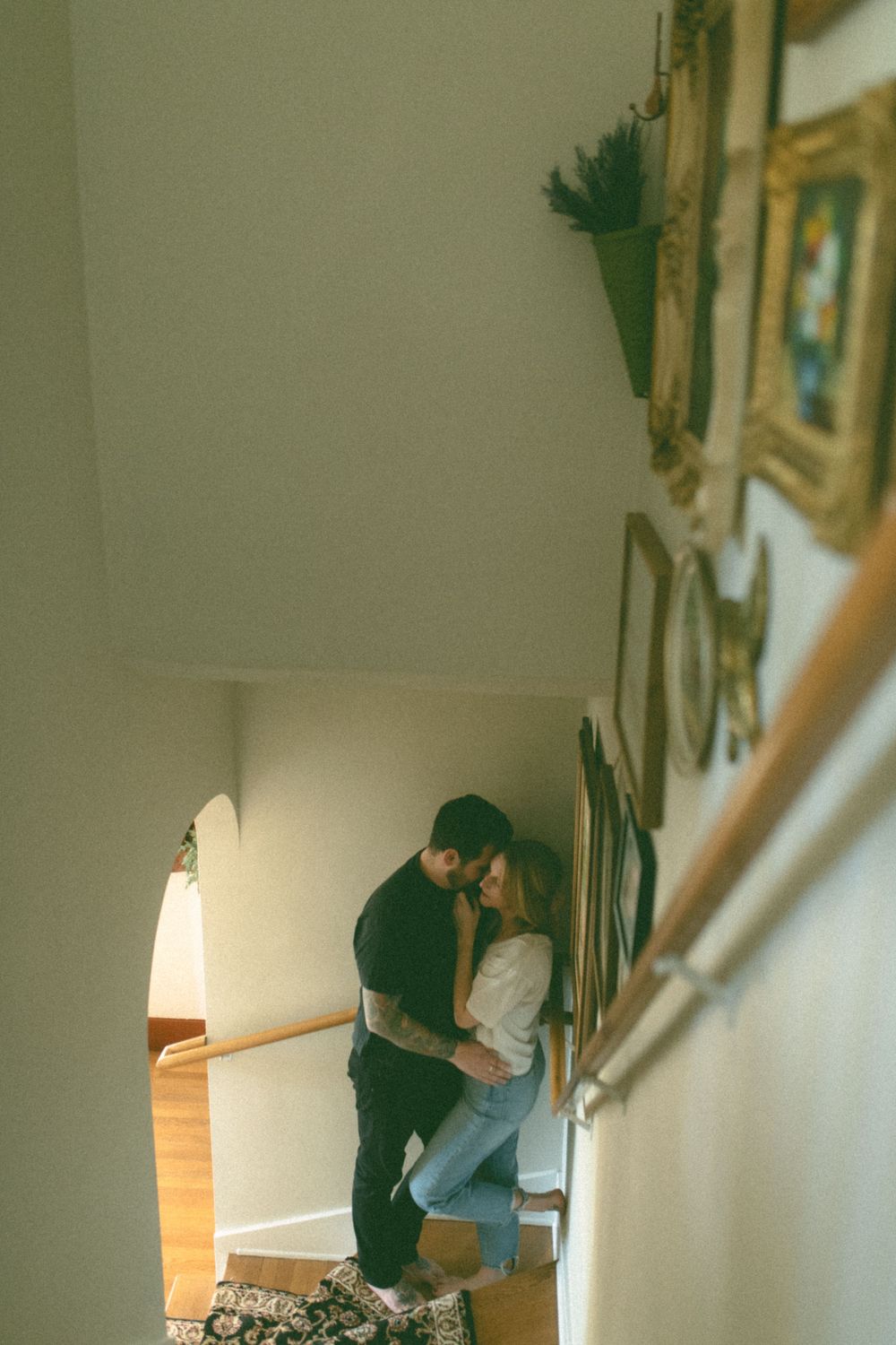 in home couples session with dog, in Grand Rapids michigan. cozy in home session. filmy family photos.