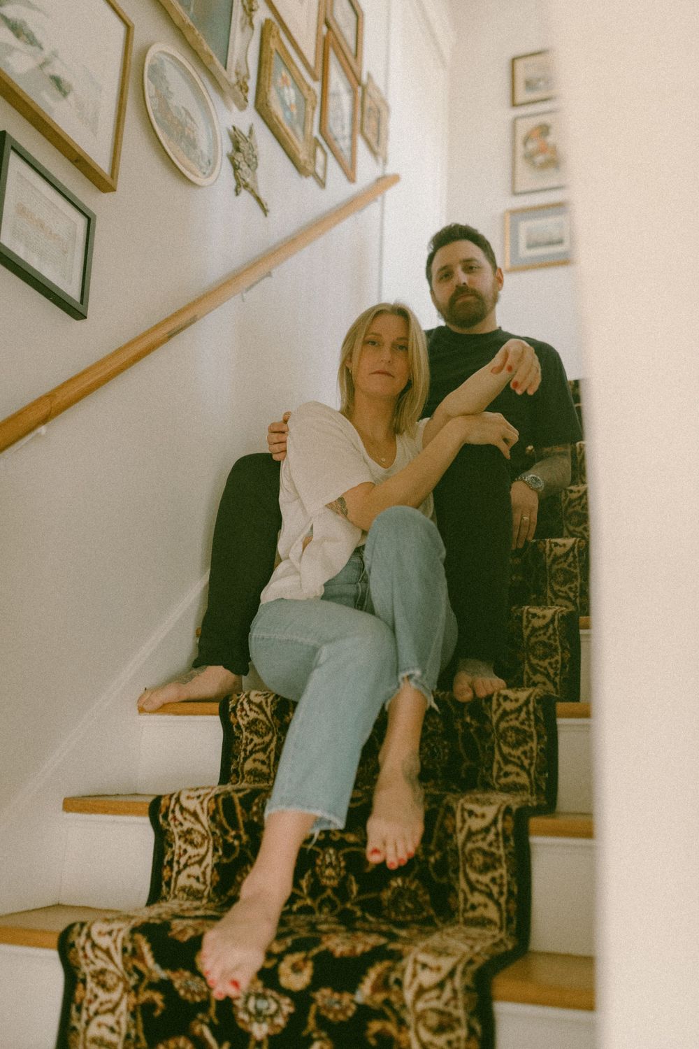 in home couples session with dog, in Grand Rapids michigan. cozy in home session. filmy family photos.