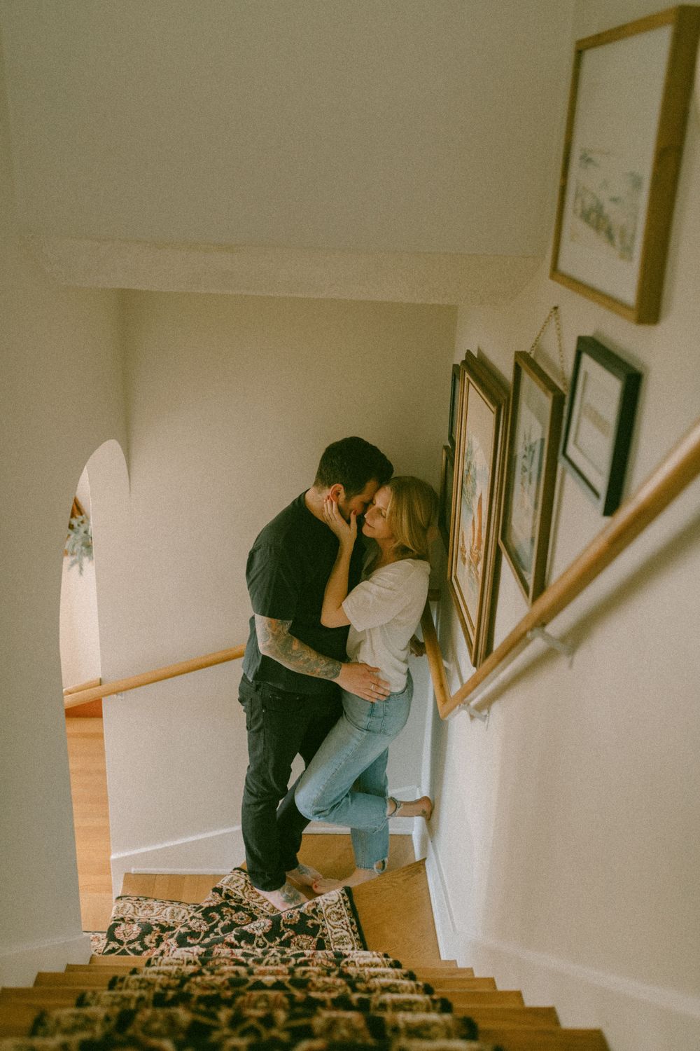 in home couples session with dog, in Grand Rapids michigan. cozy in home session. filmy family photos.