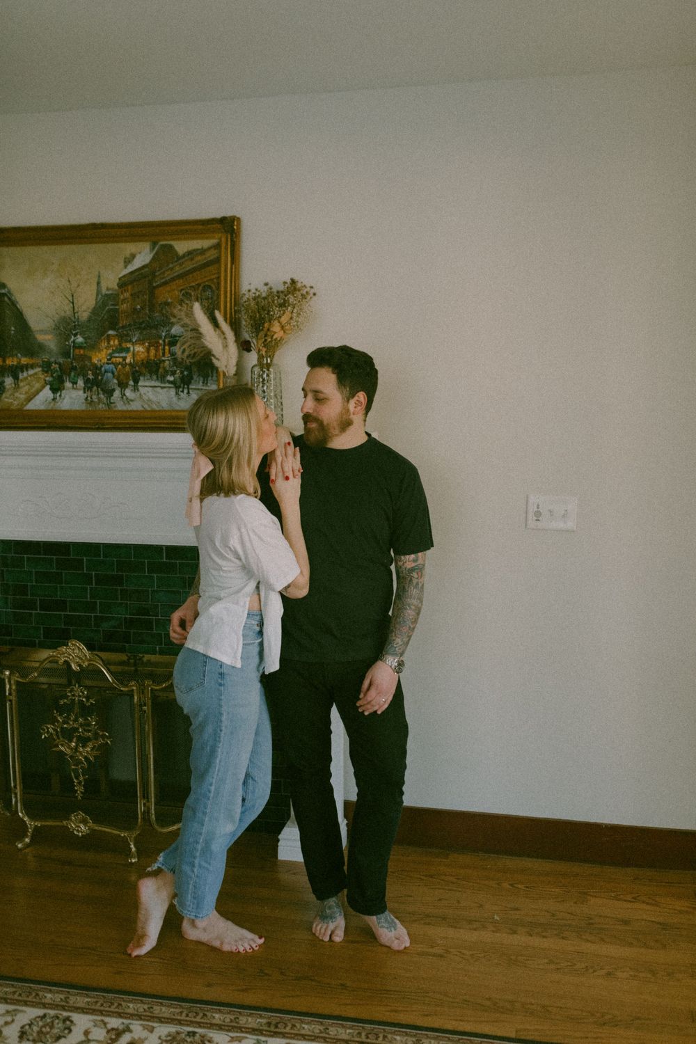in home couples session with dog, in Grand Rapids michigan. cozy in home session. filmy family photos.