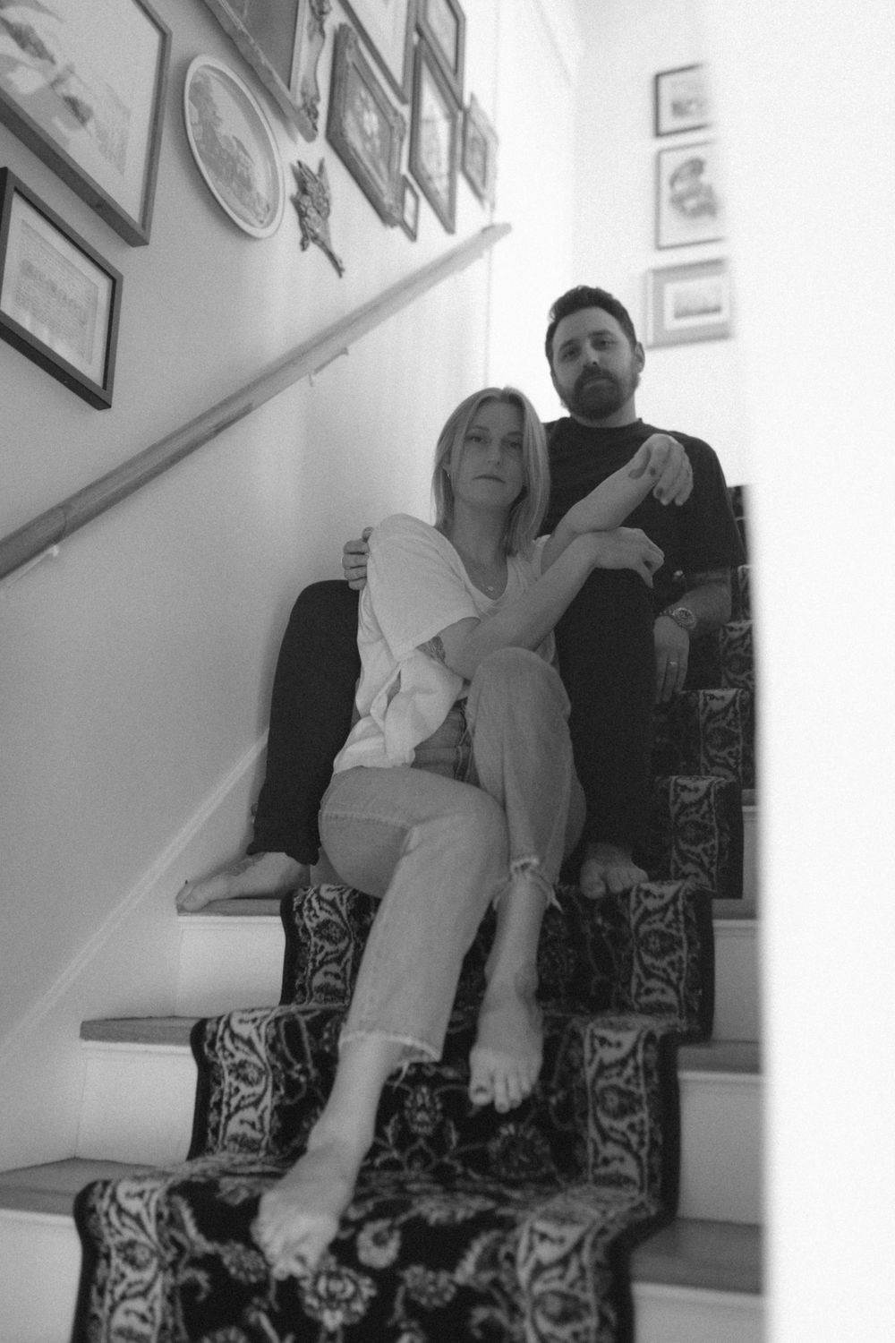 in home couples session with dog, in Grand Rapids michigan. cozy in home session. filmy family photos.