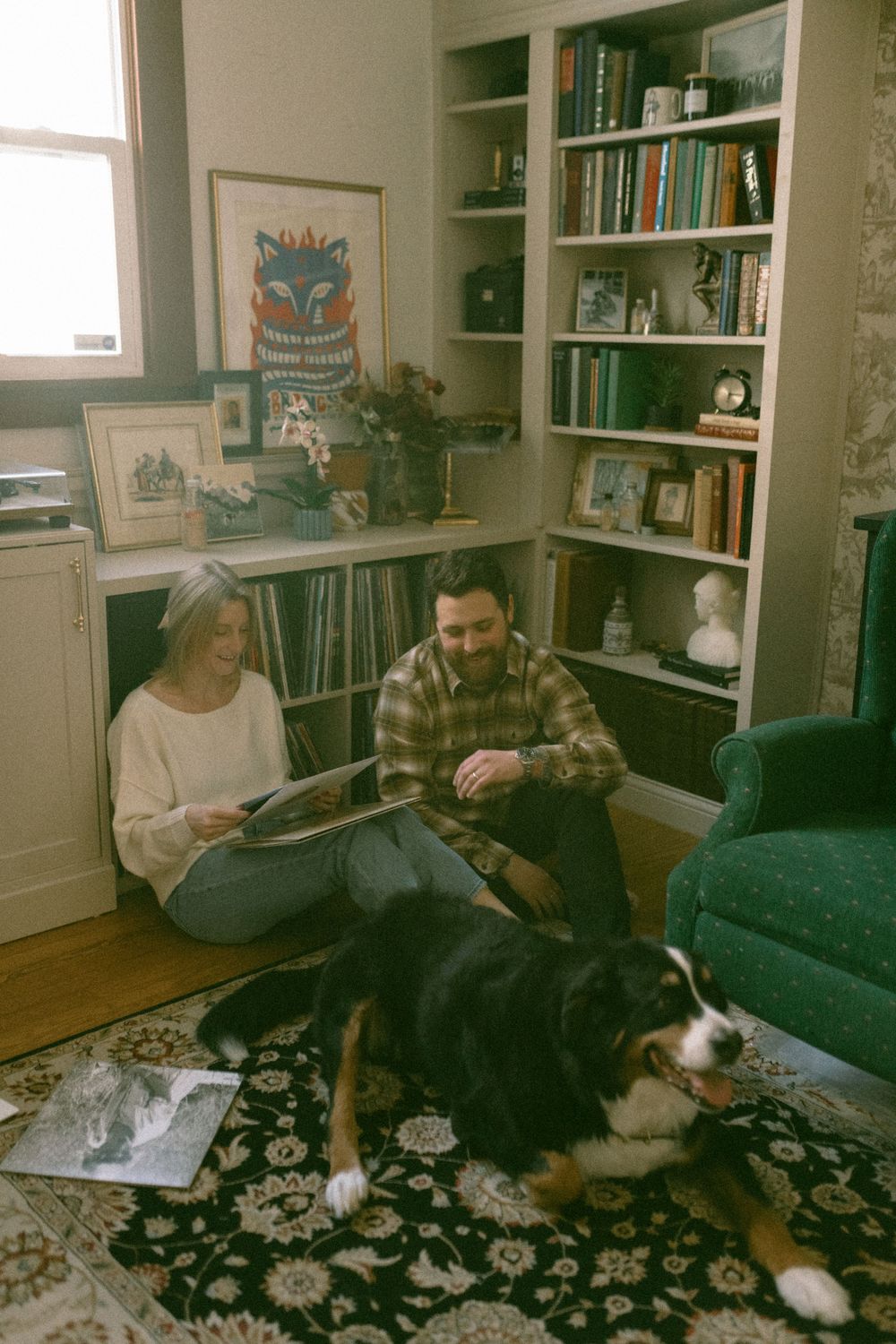 in home couples session with dog, in Grand Rapids michigan. cozy in home session. filmy family photos.