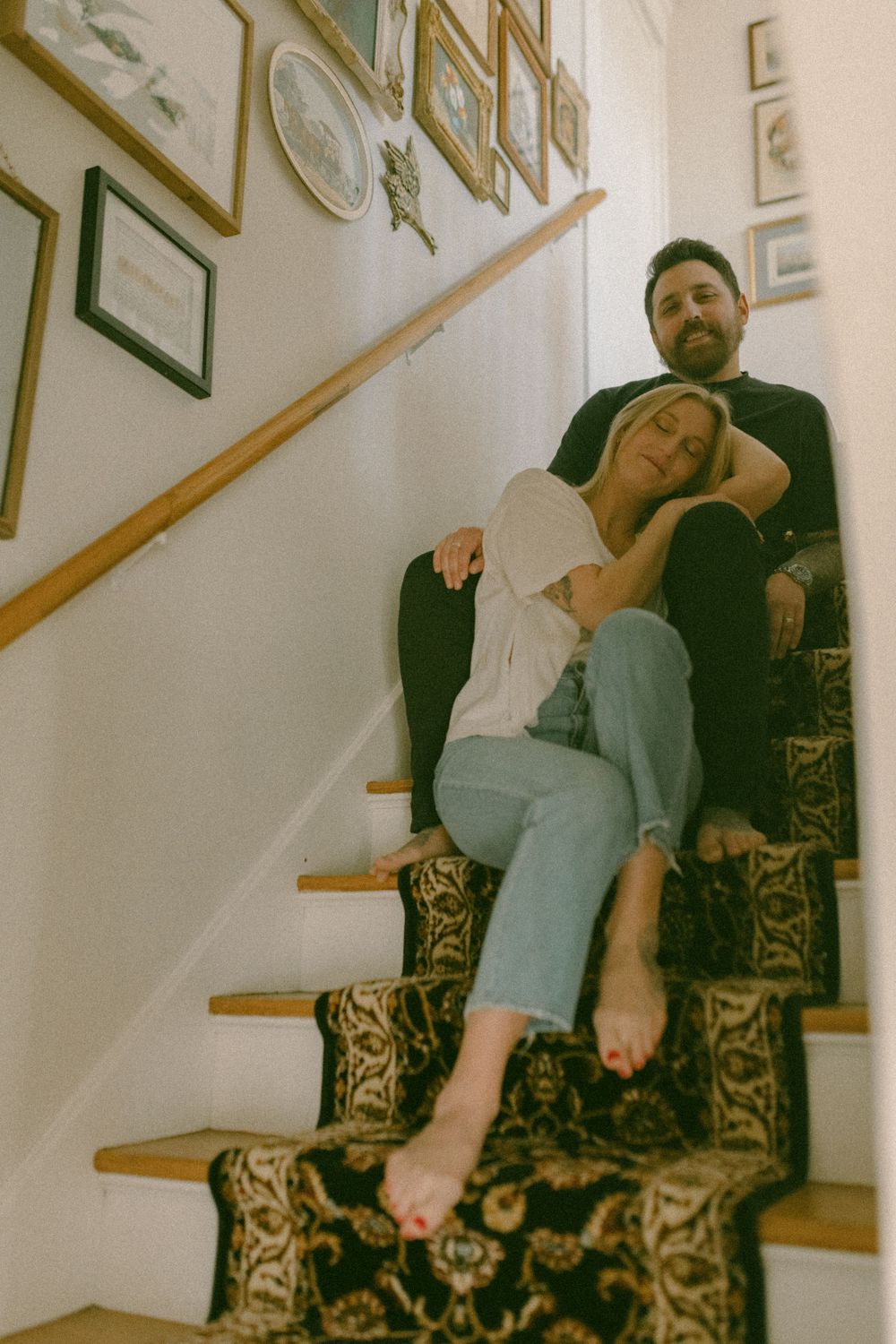 in home couples session with dog, in Grand Rapids michigan. cozy in home session. filmy family photos.