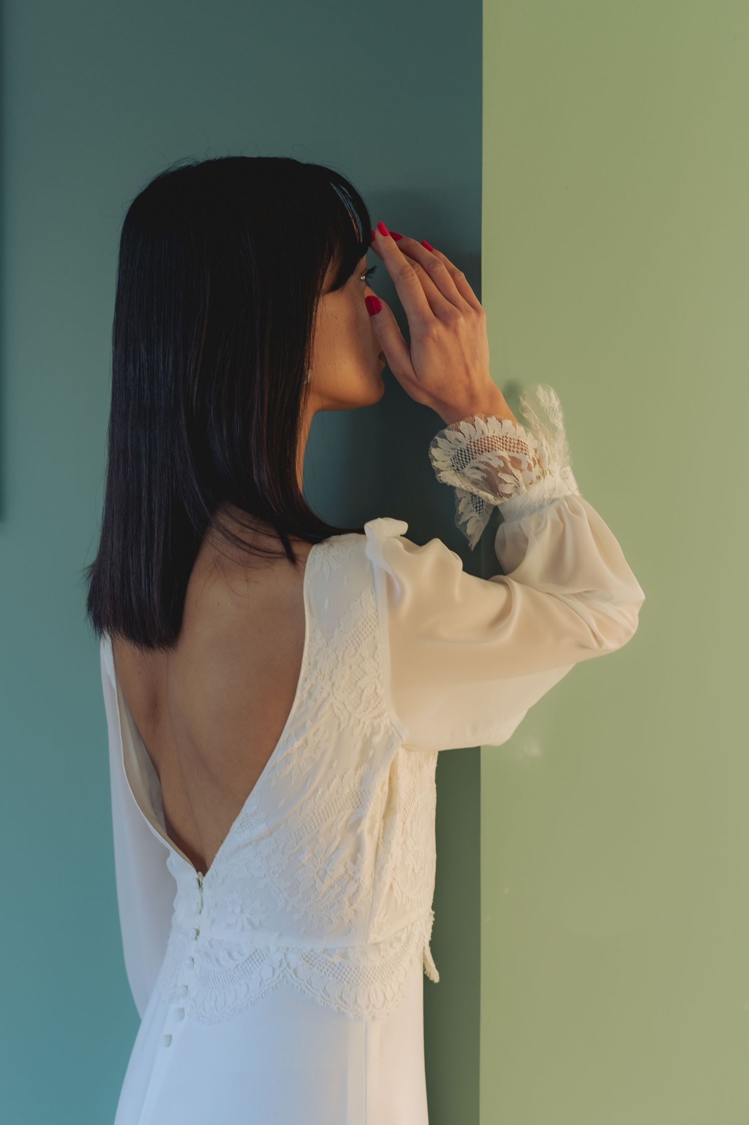 A figure in a white blouse poses against a muted background showing different angles and movements.