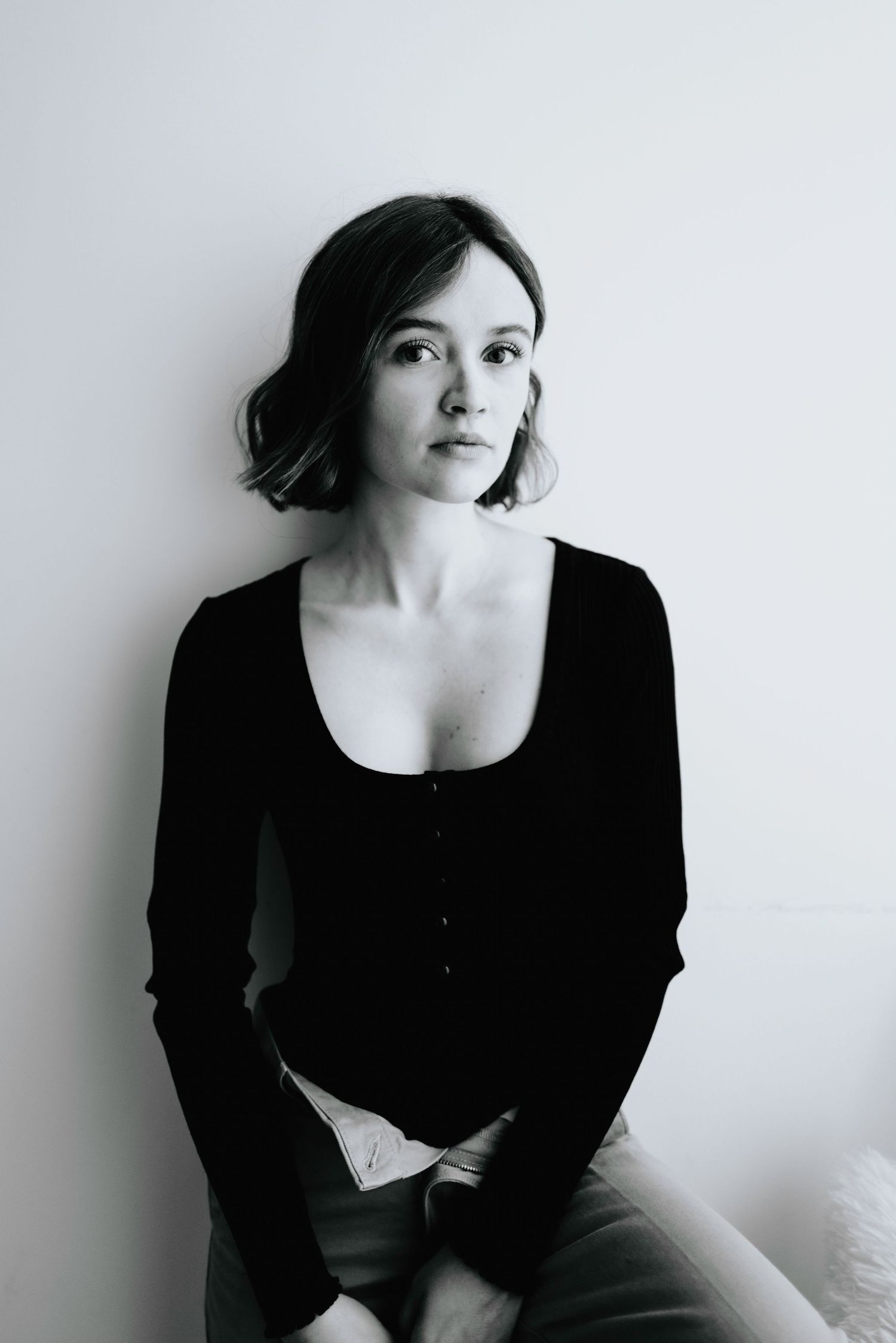 Minimalist black and white portrait series against a plain white background.