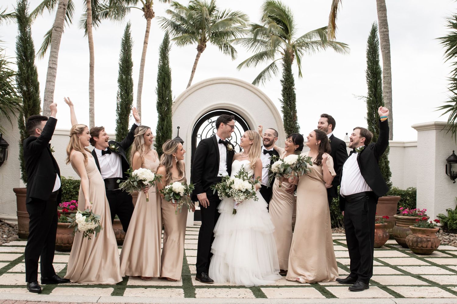 wedding party on wedding day beautiful landscaping