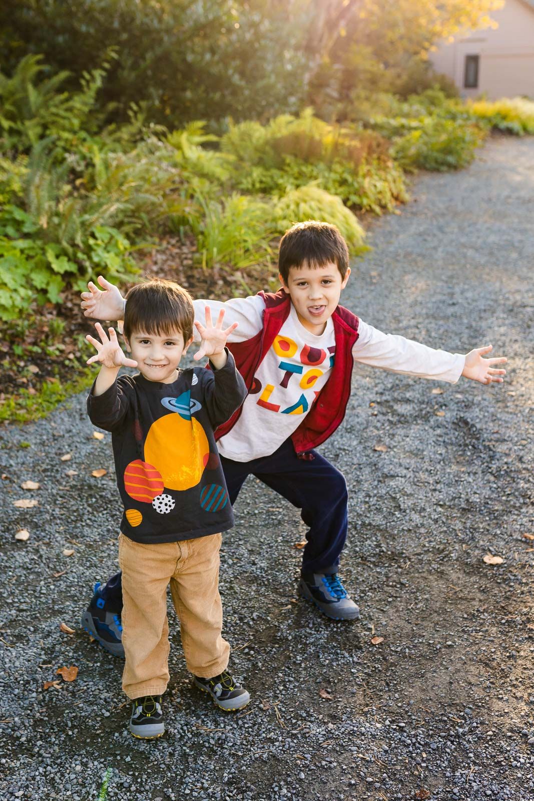 Candid moment of brothers playing at sunset in Bellevue
