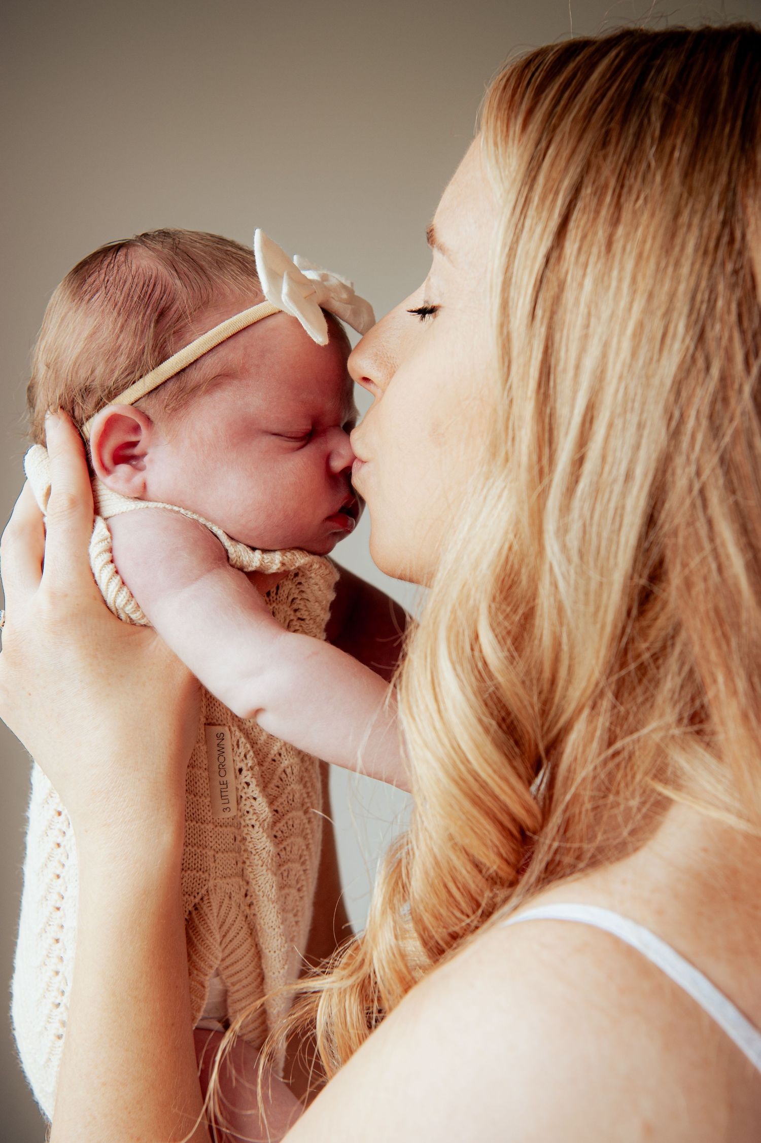 An intimate moment shared with a sleeping newborn in soft lighting.
Altona Family Photographer Melbourne