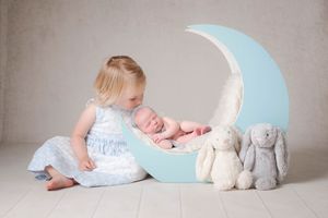 newborn baby with 2 year old sibling